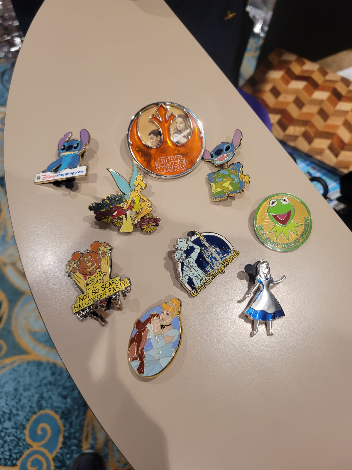 Lisa's pin trading collection laid out