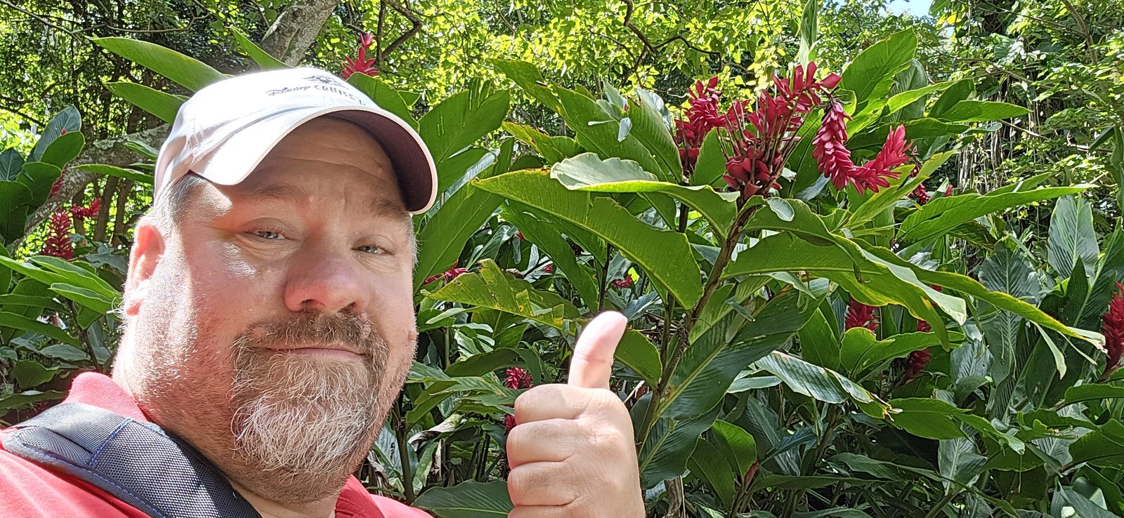 Michael among the red ginger flowers