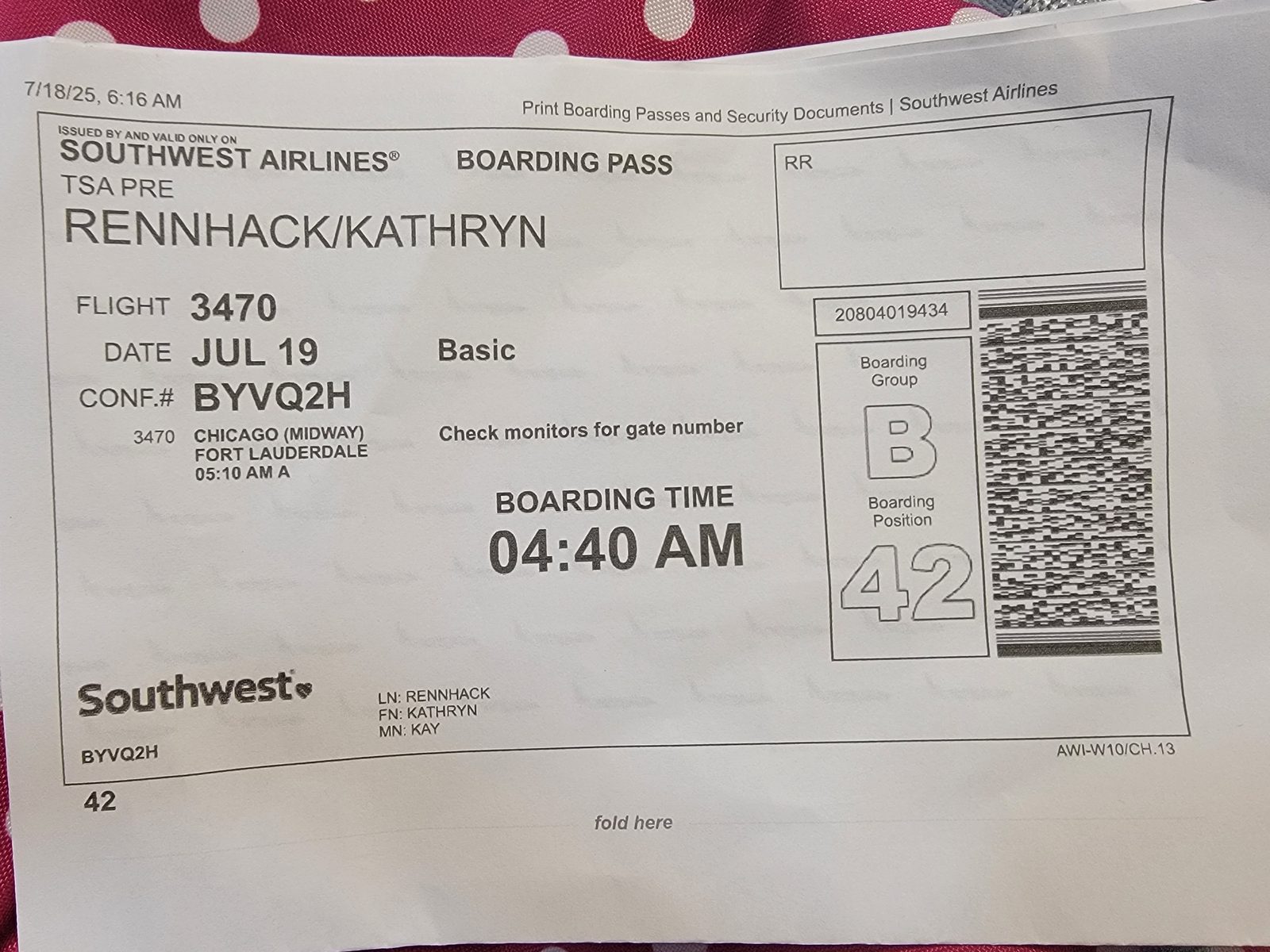 Kathy's boarding pass for the early flight