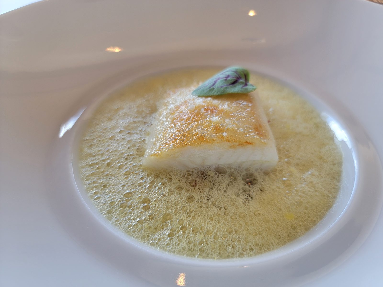 A fish course at Remy