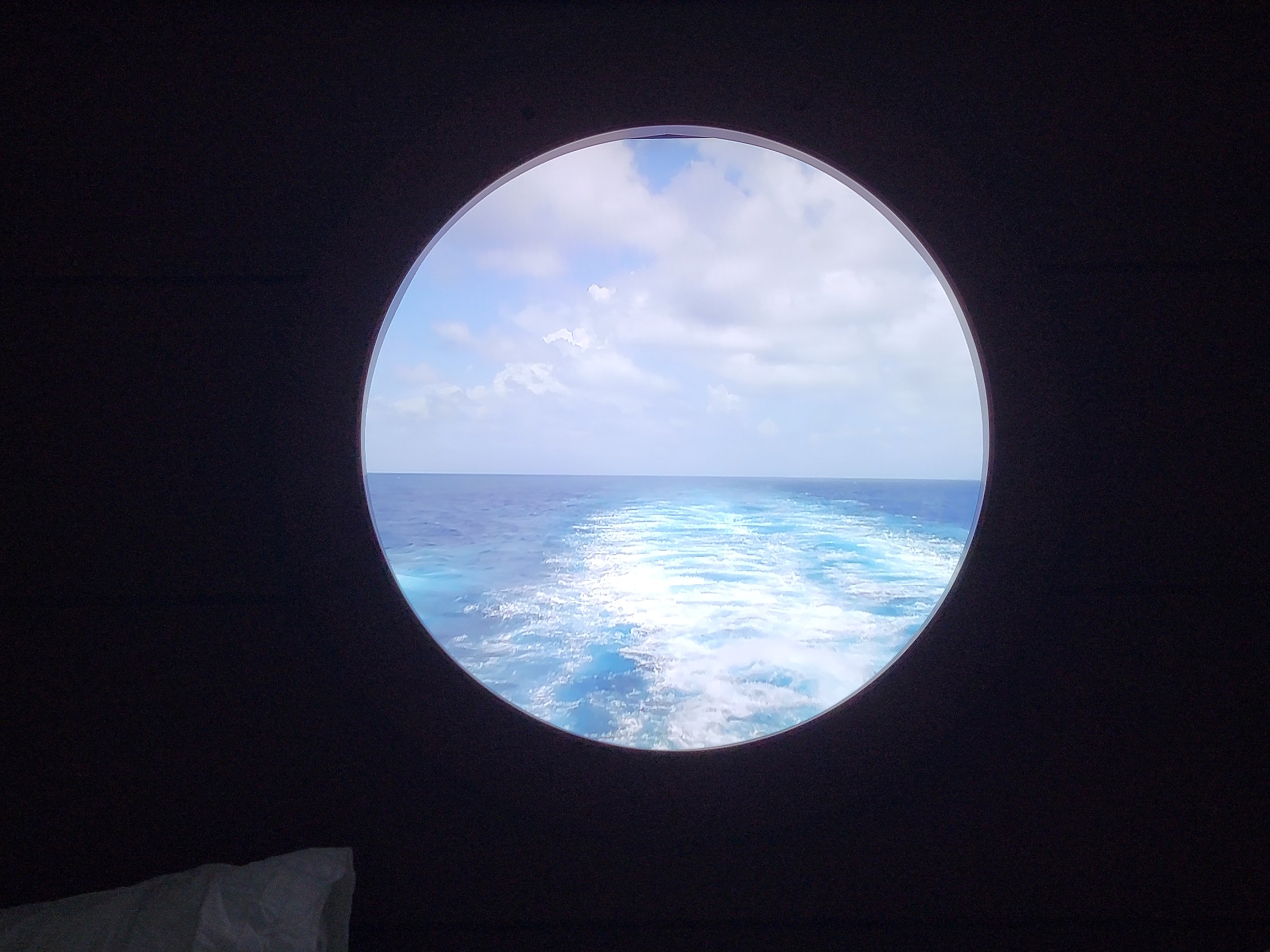 The wake through the stateroom porthole