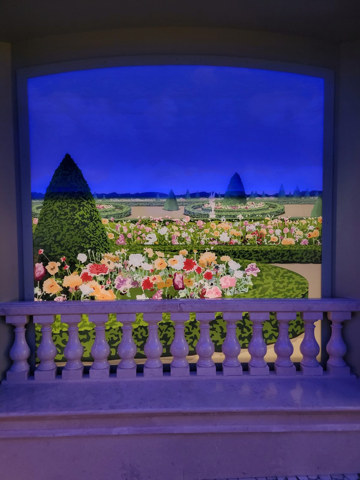 The Enchanted Garden's painted window scene