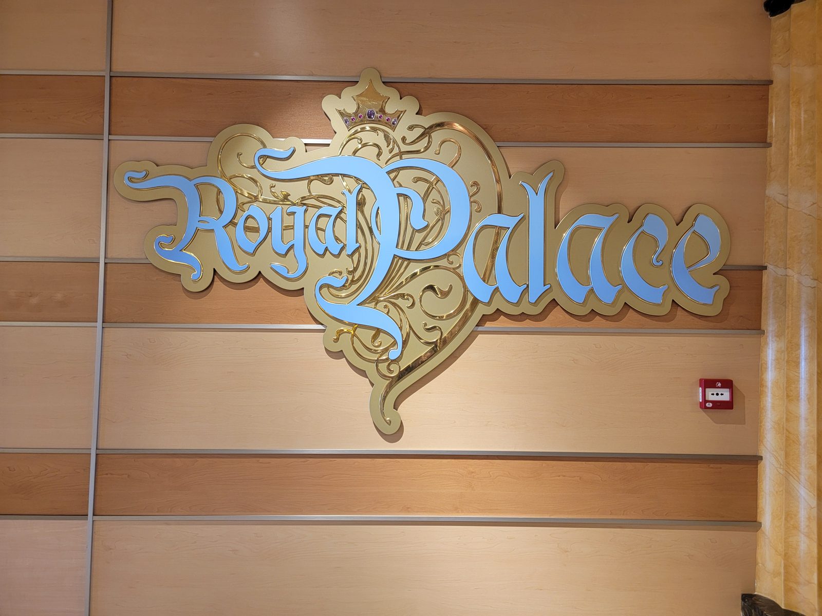 The Royal Palace sign aboard ship