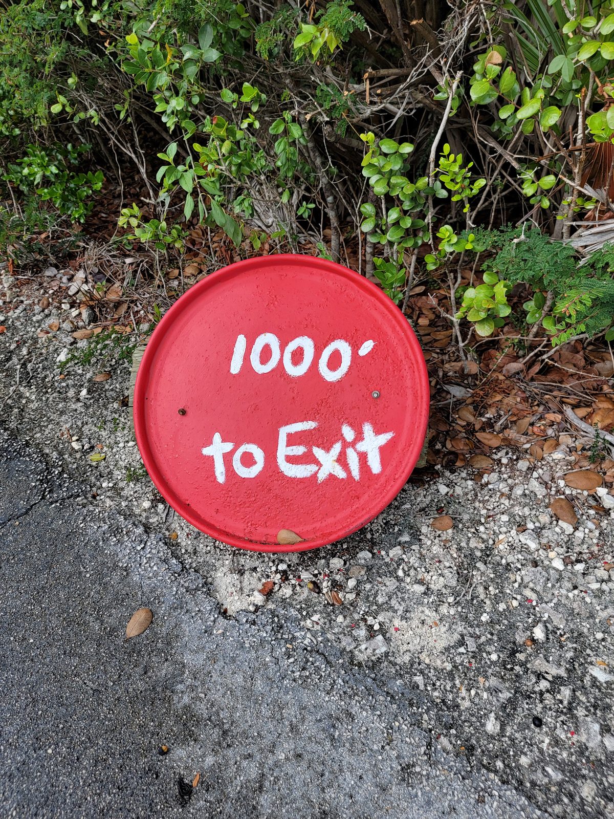 A course sign: 1000 feet to the exit