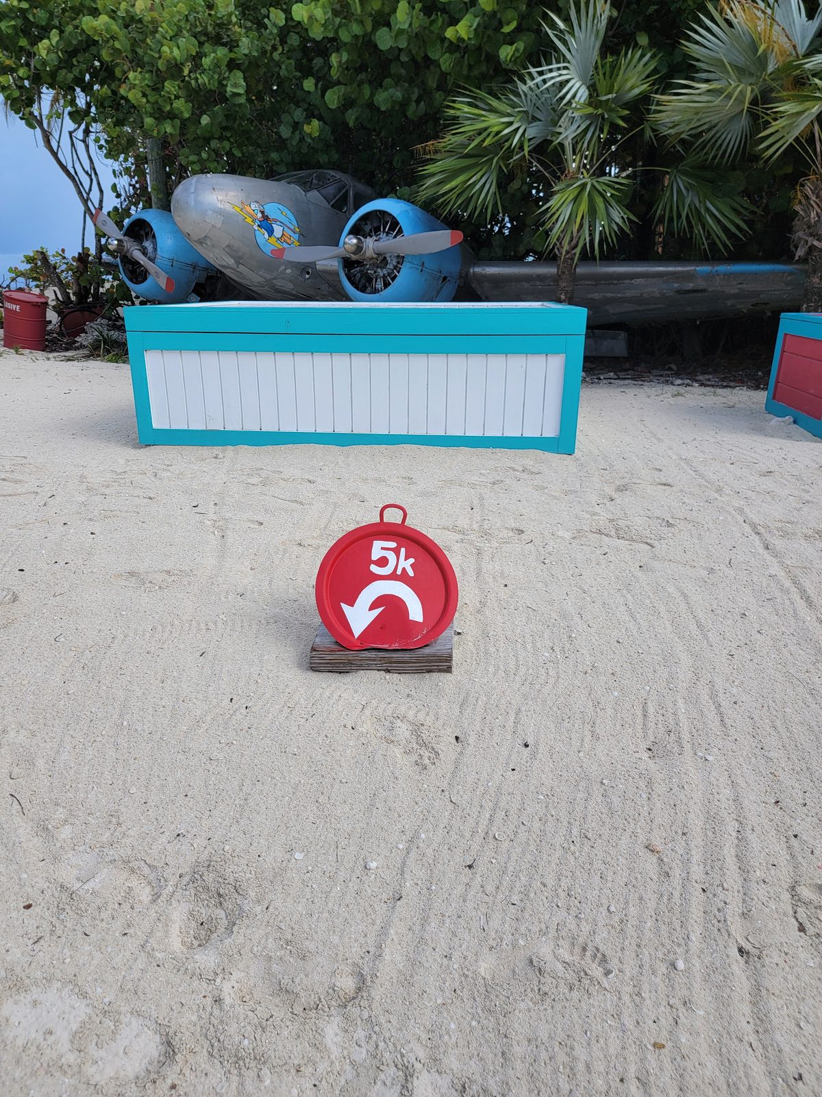 A Castaway Cay 5K course marker