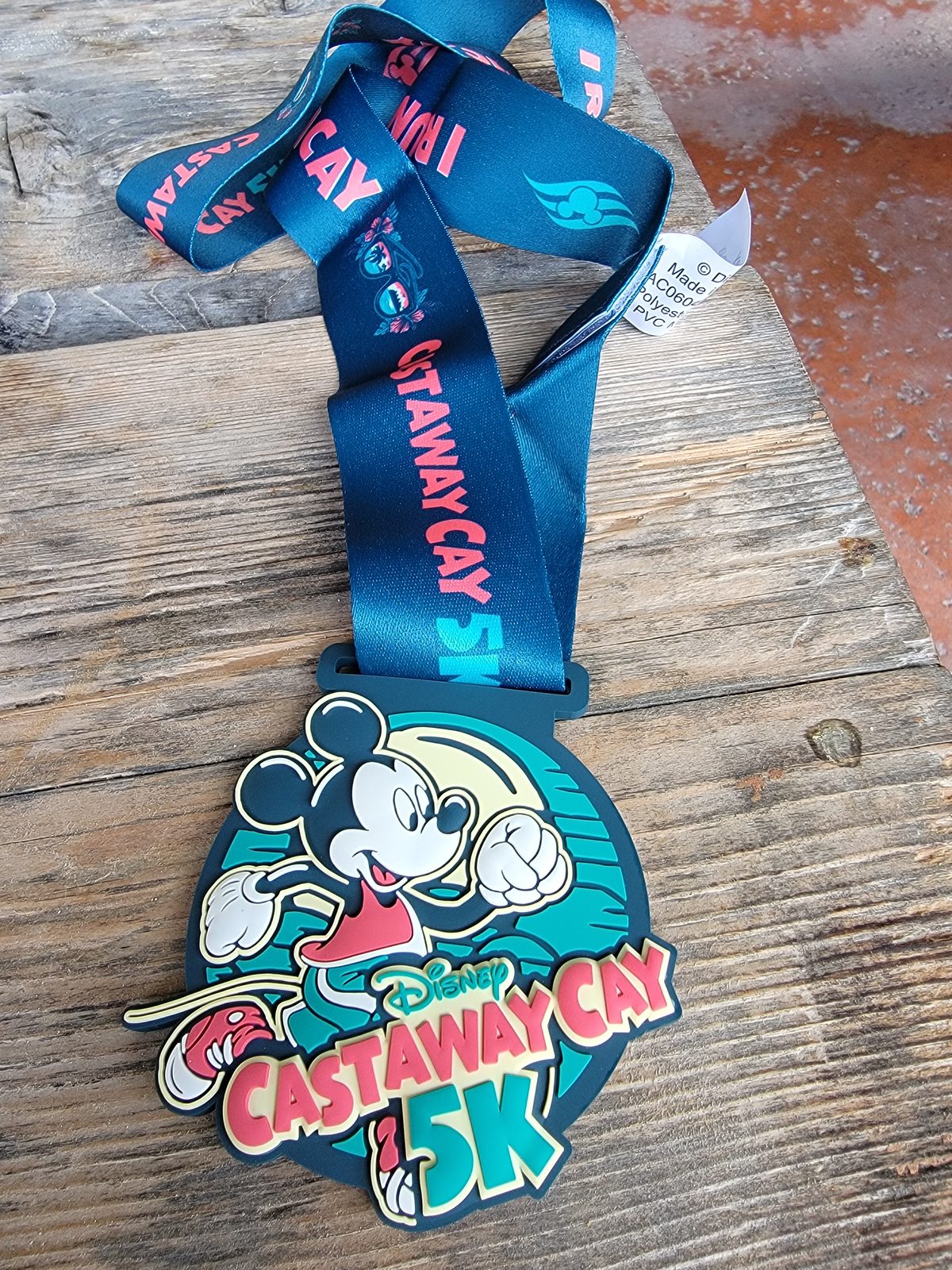 Kathy's medal from the Castaway Cay 5K