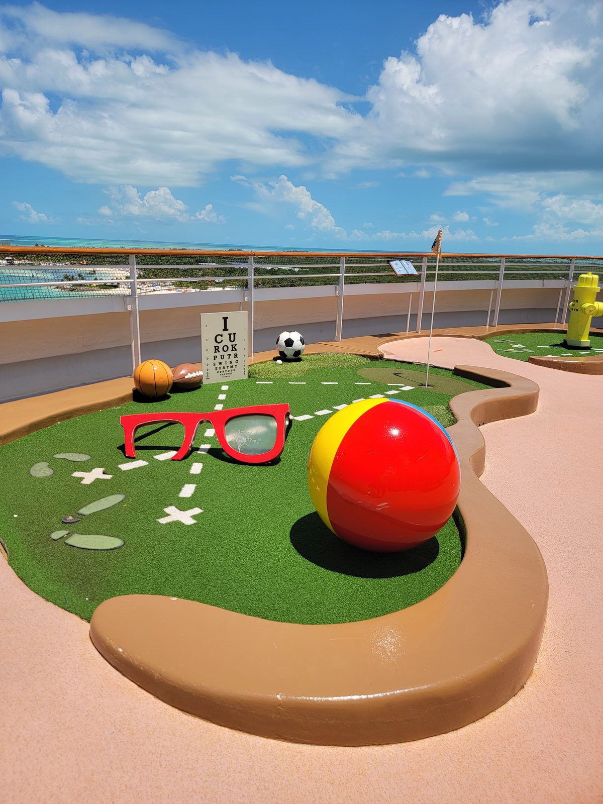 A playful mini golf hole back on the ship