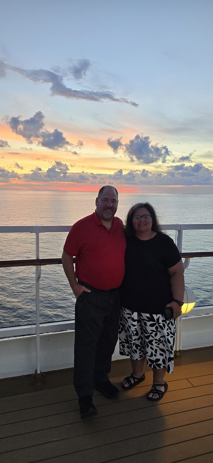 Kathy and Michael on deck at sunset