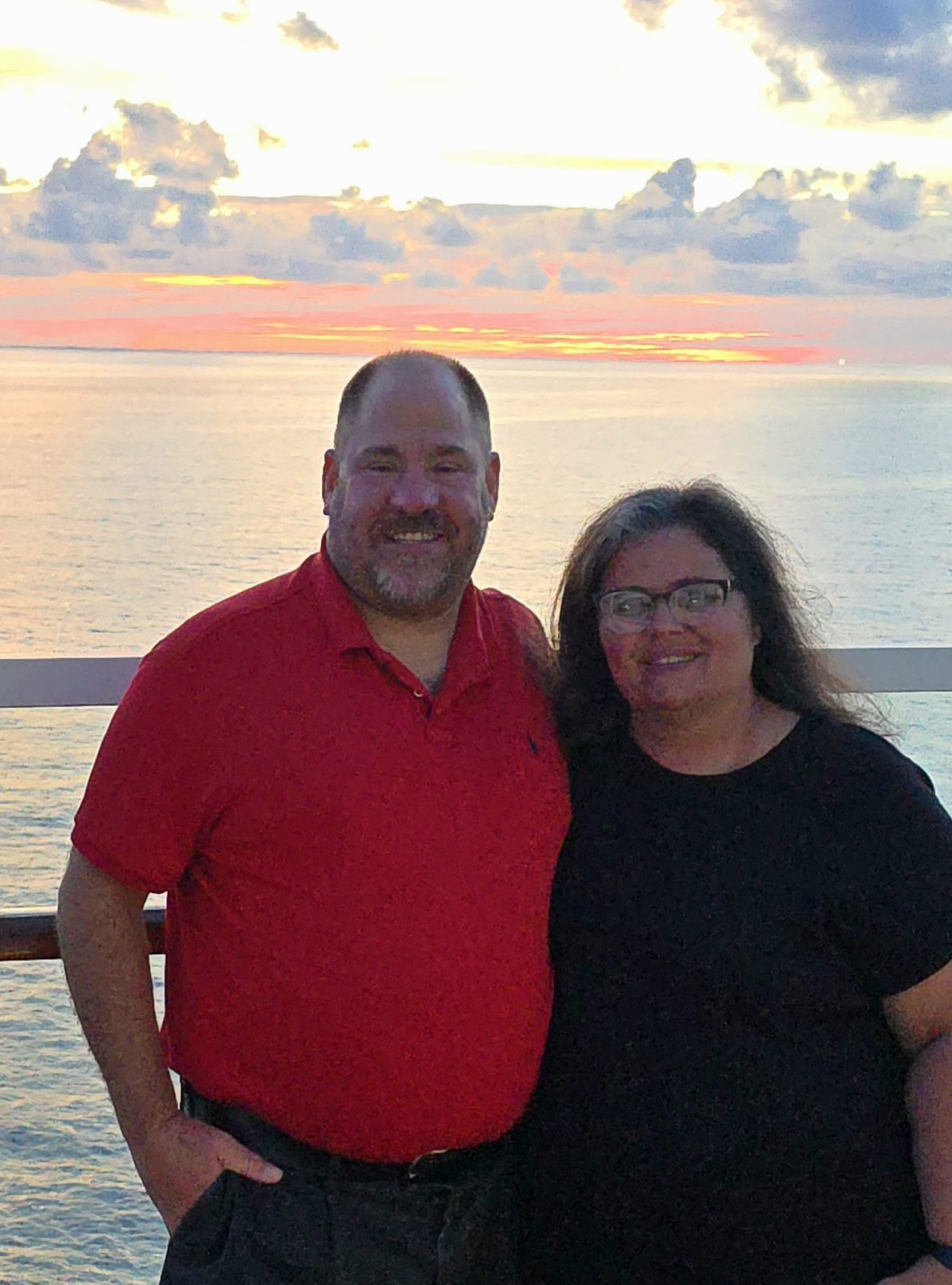 Together on deck at sunset