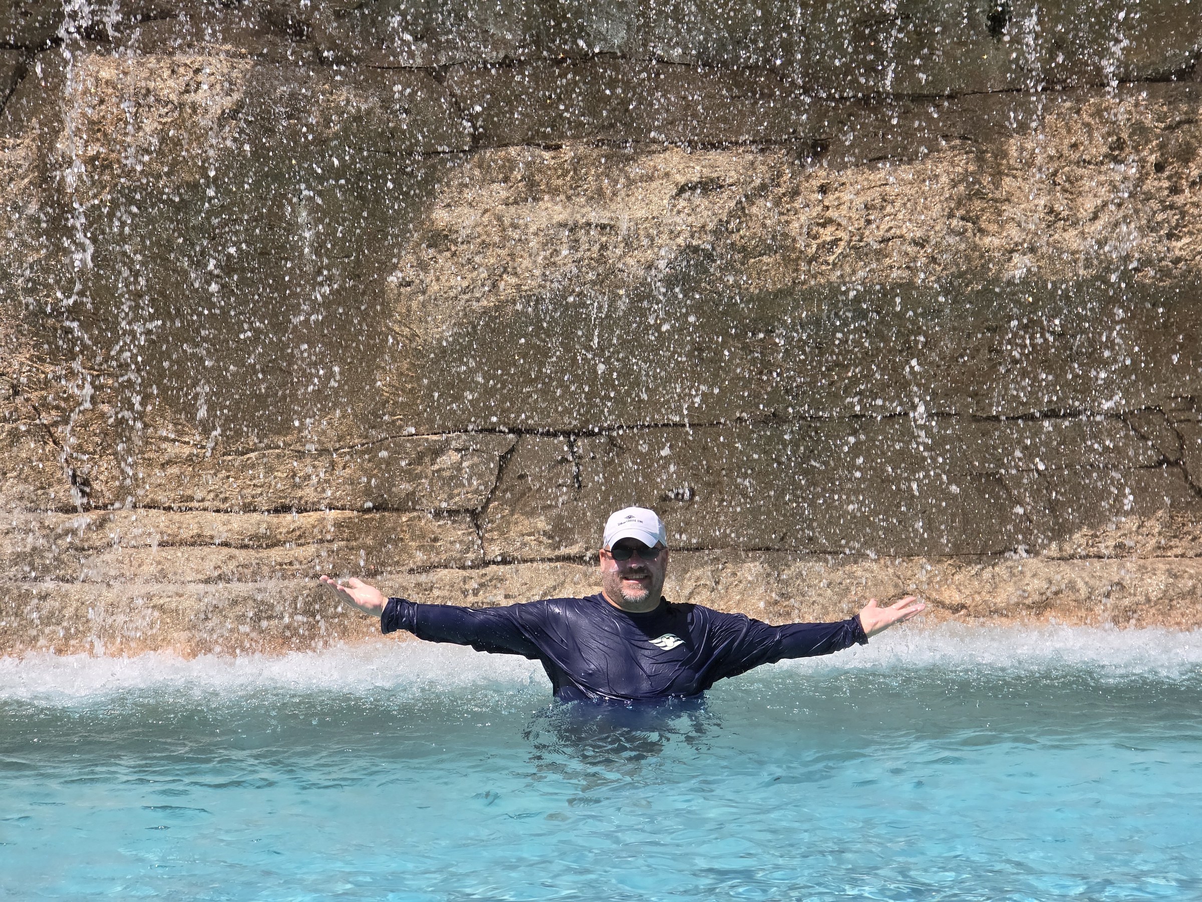 Michael under the waterfall at Atlantis