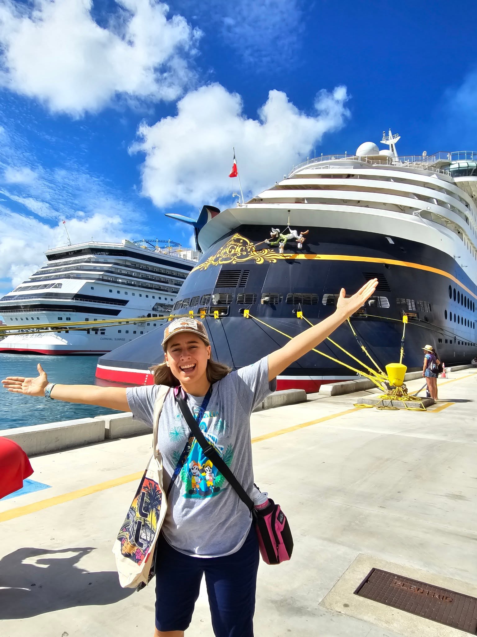 Lisa in front of the Disney Magic in Nassau