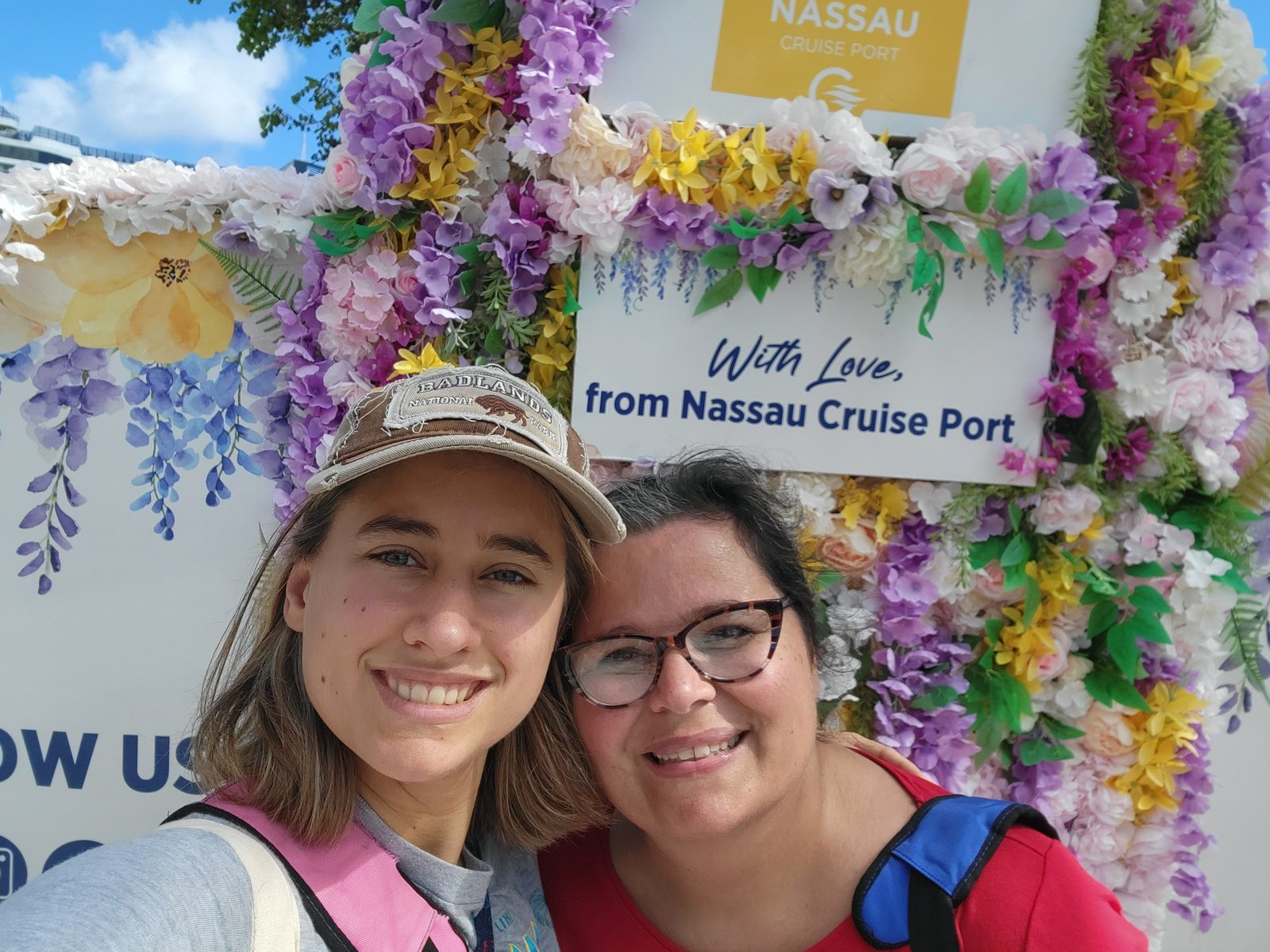 Kathy and Lisa at the Nassau sign