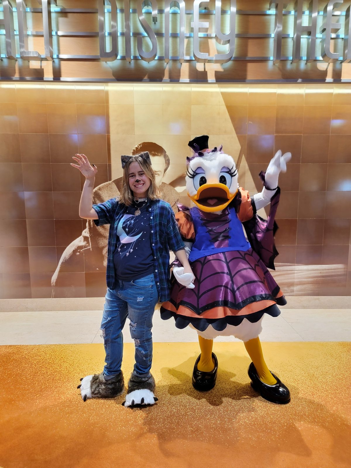 Lisa meets Daisy Duck, dressed as a witch