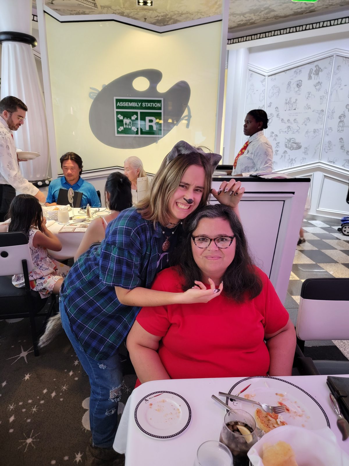 Kathy and Lisa at dinner, still in costume