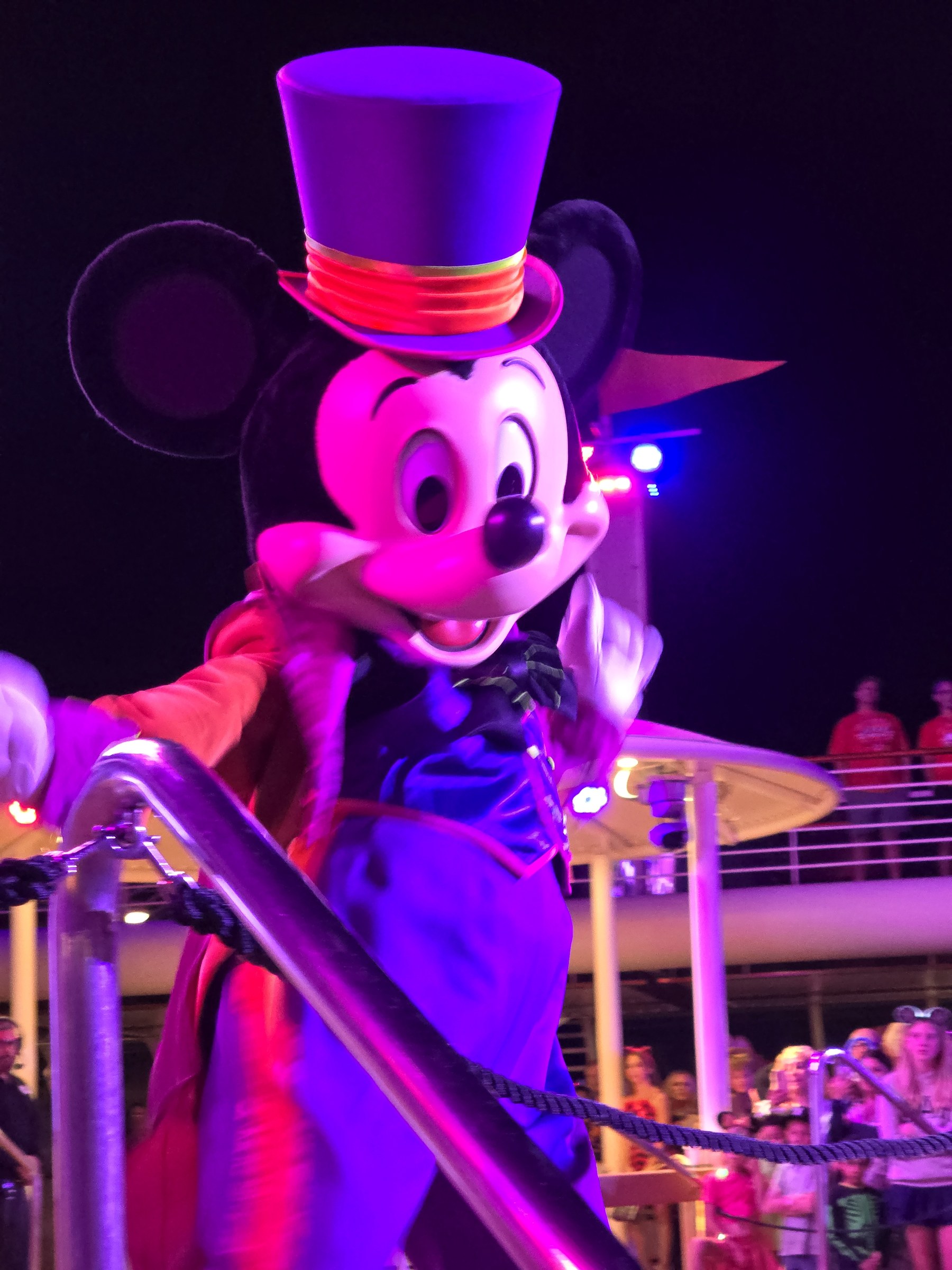Mickey in his purple top hat Halloween costume at Mickey's Mouse-Querade Party
