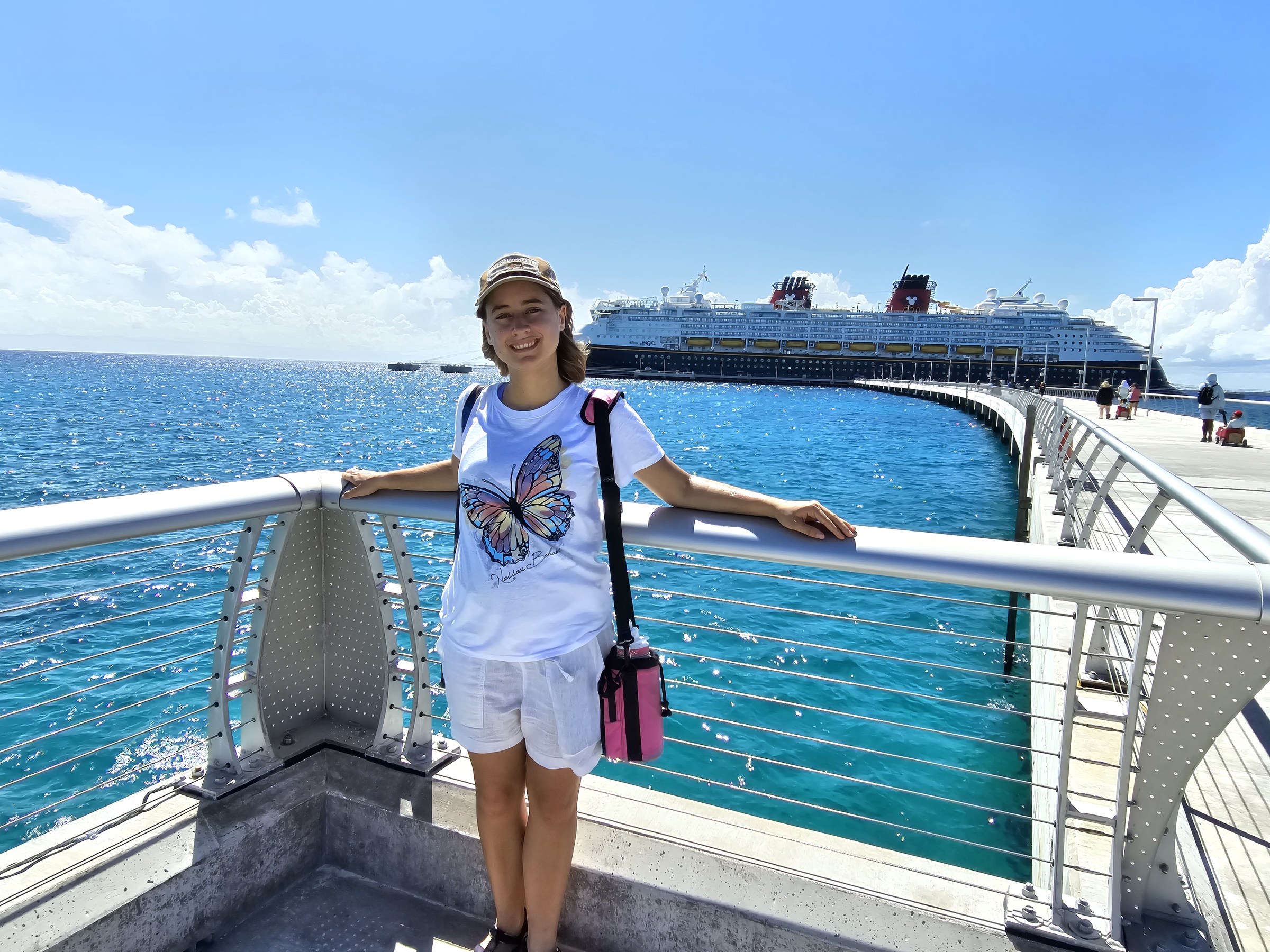 Lisa on the pier, the ship behind her