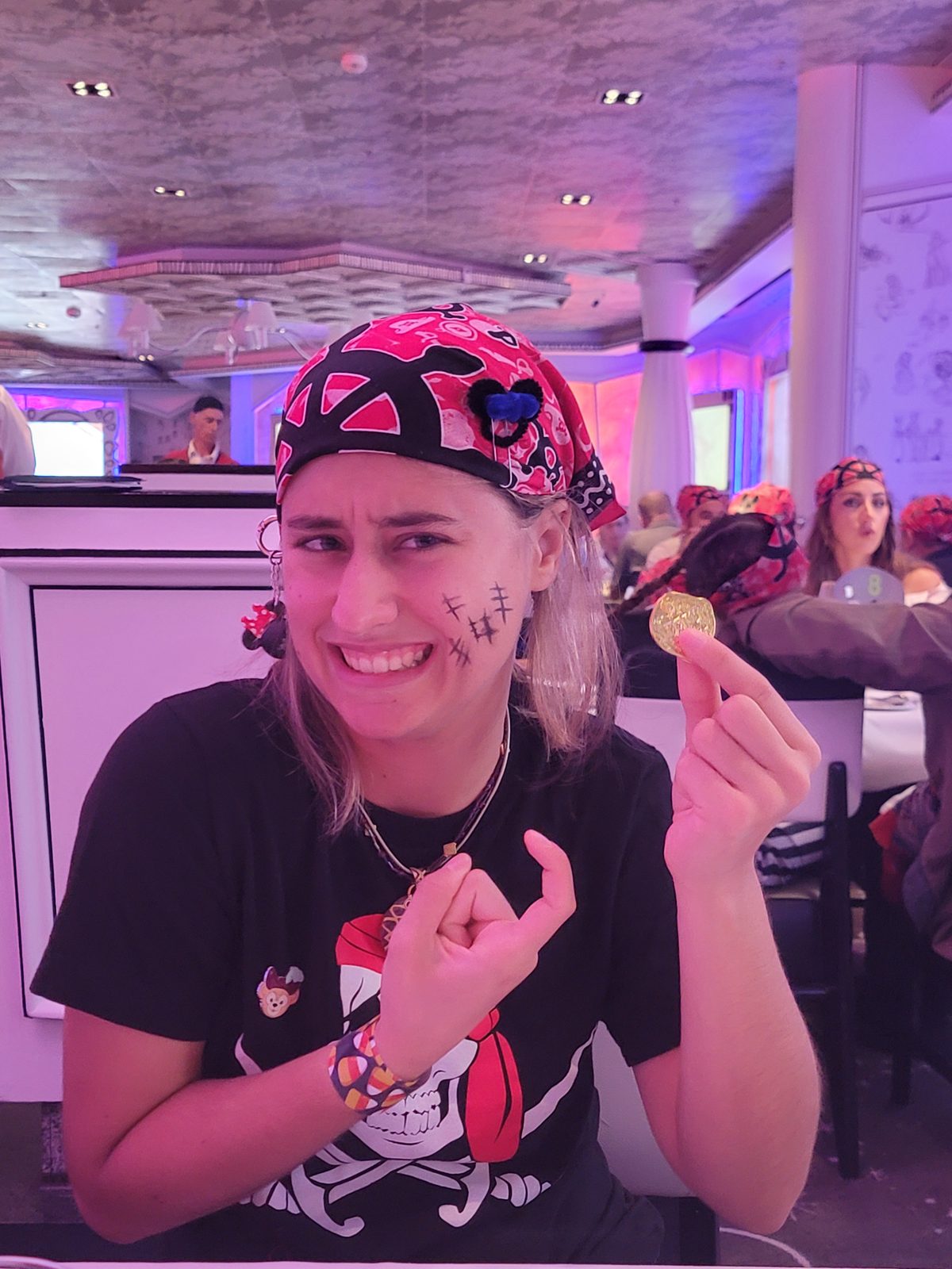 Lisa in pirate gear at dinner