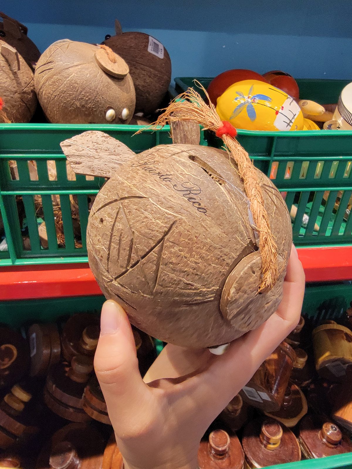 A carved coconut souvenir at the San Juan airport