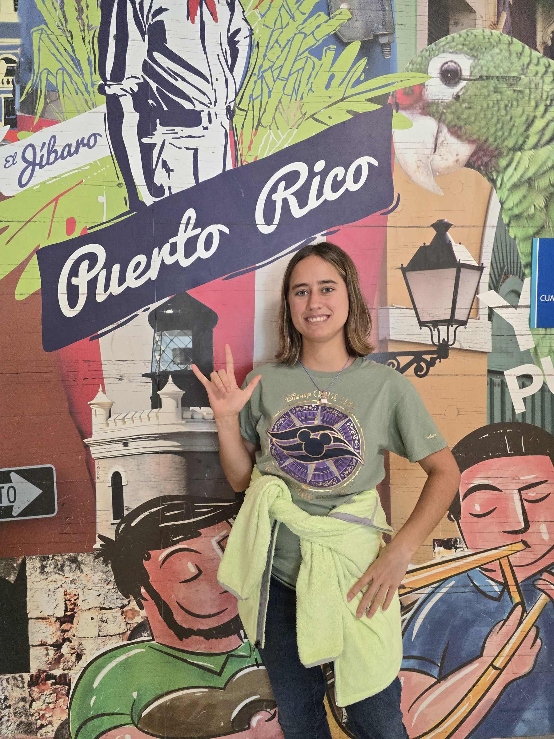 Lisa at a Puerto Rico mural in the San Juan airport