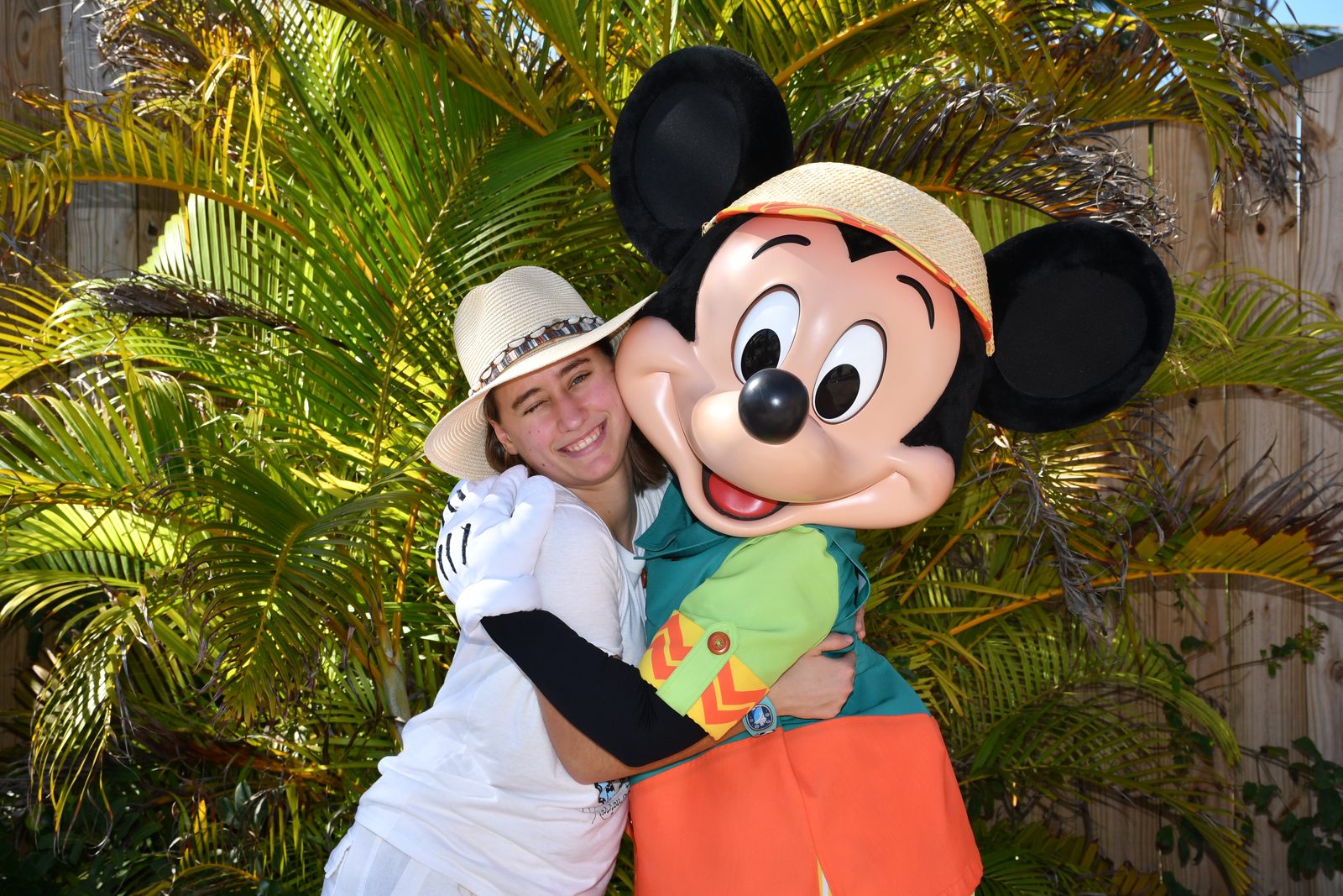 Hugging Mickey Mouse in the garden