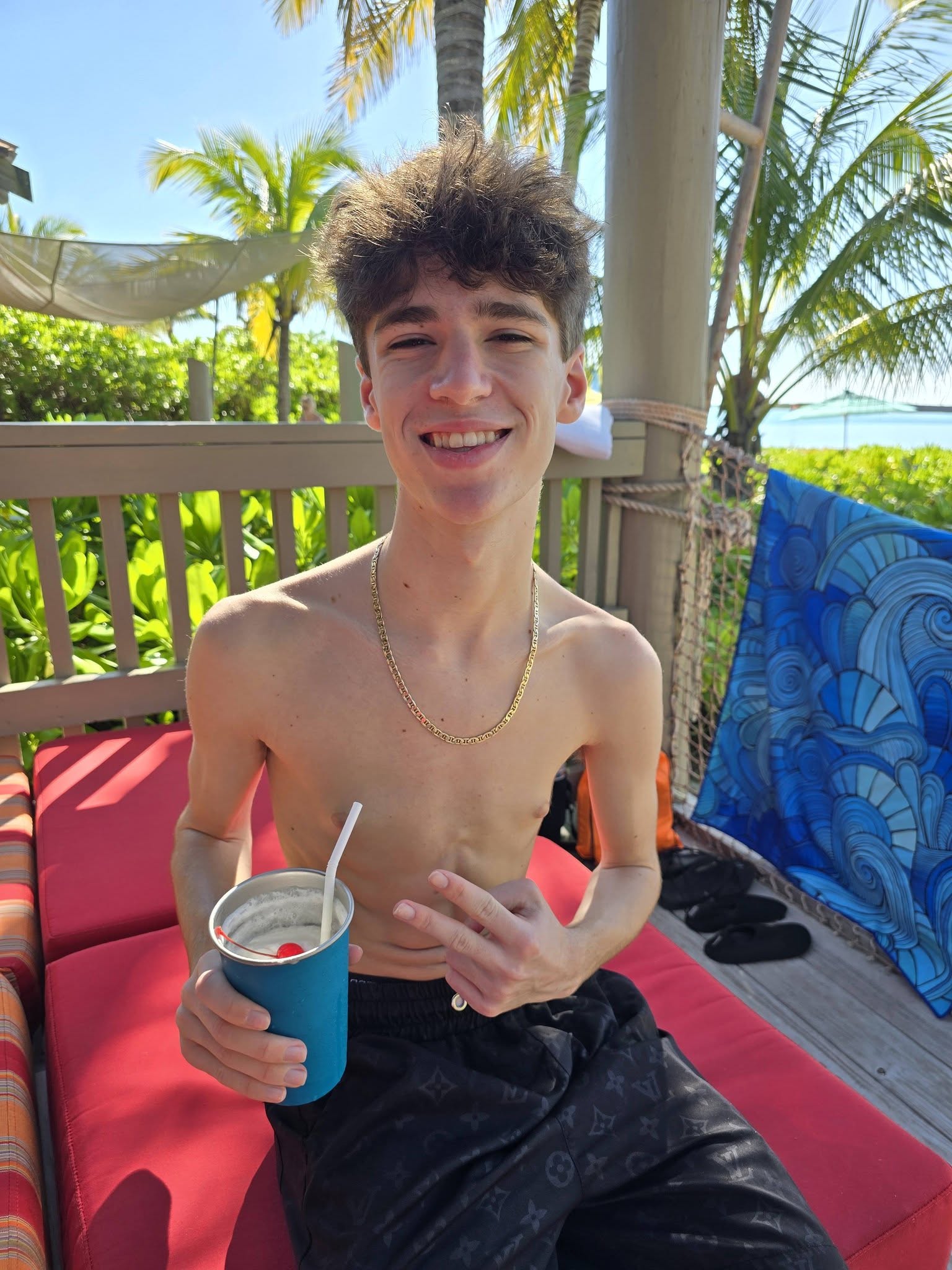 Thomas on the cabana lounger at Castaway Cay