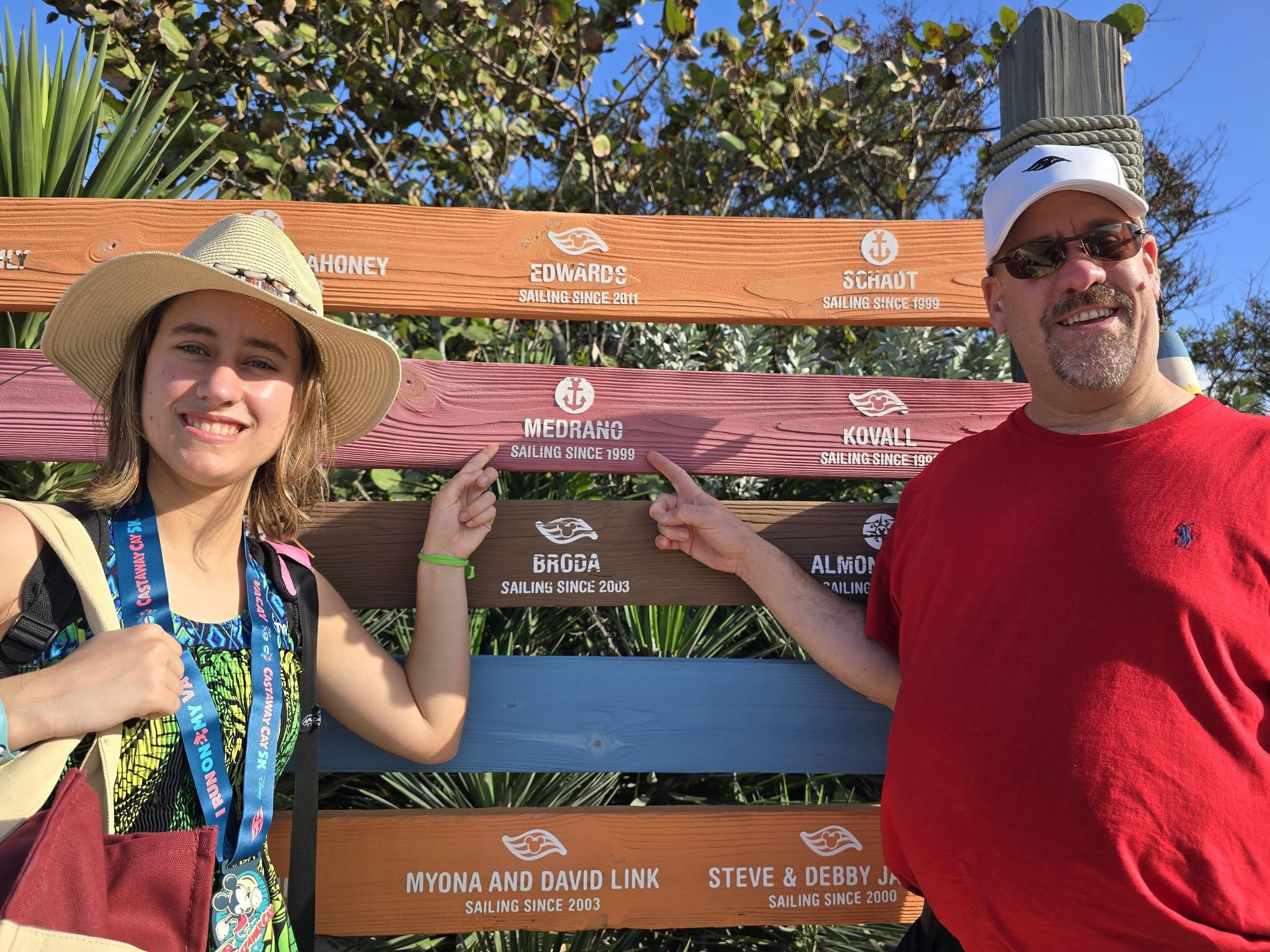 Lisa and Michael at Marco's name board at Castaway Cay