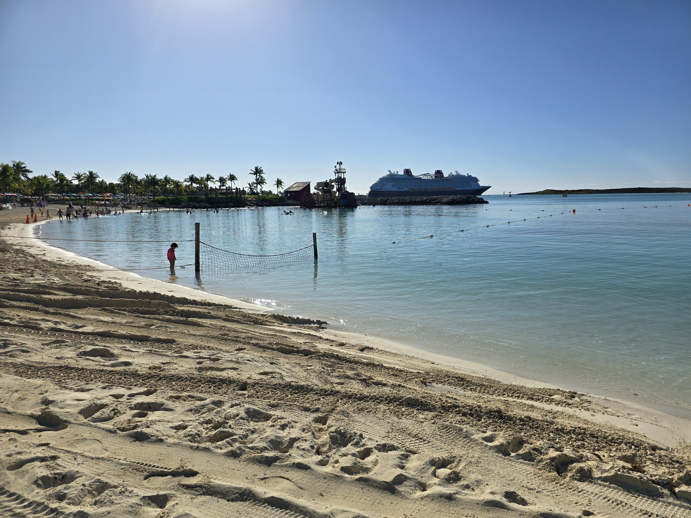Castaway Cay's beach in the morning, the Destiny at the pier