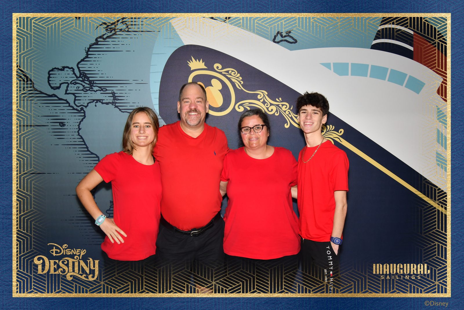 The four of us at the welcome aboard backdrop