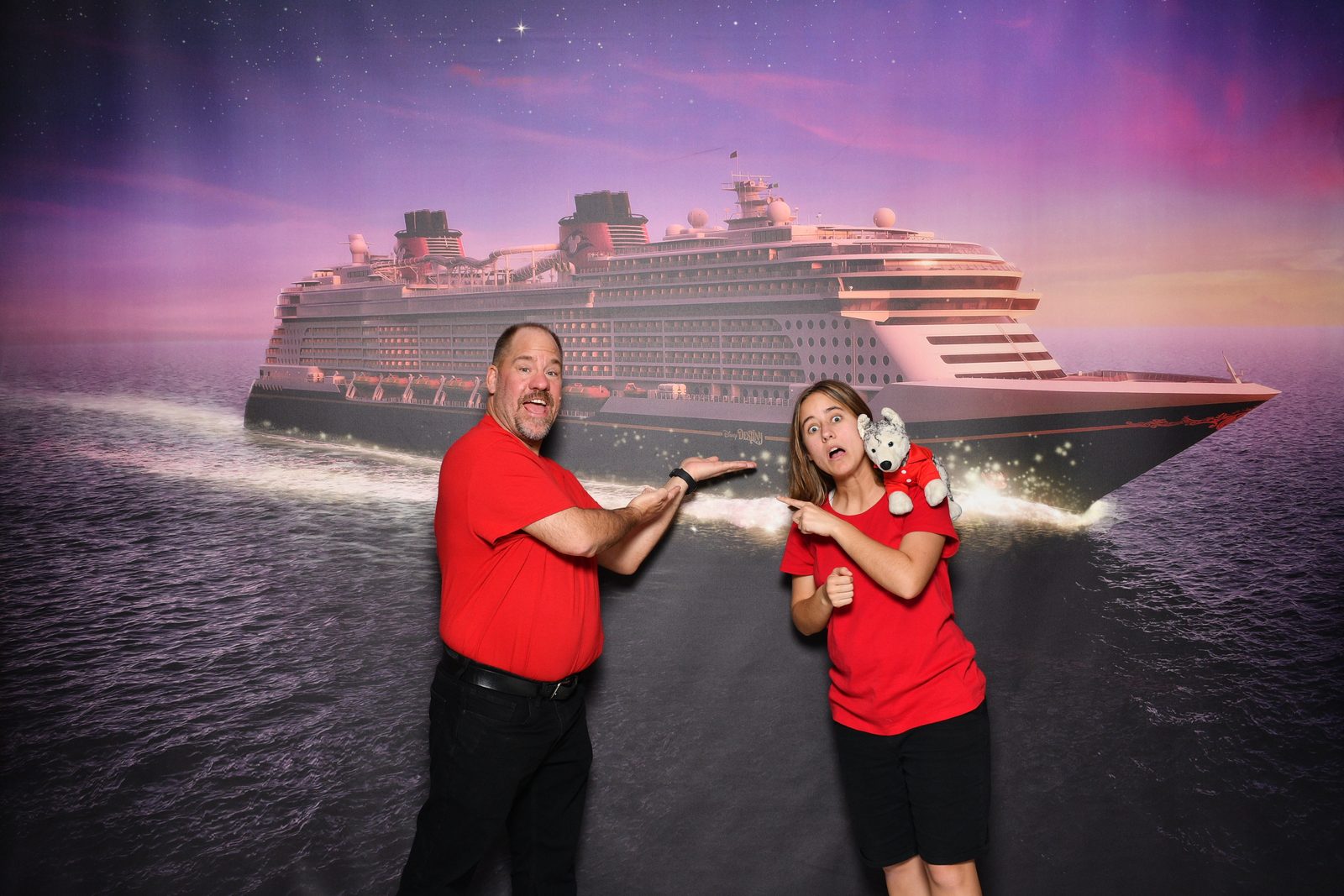 Michael, Lisa and Bob before the ship backdrop