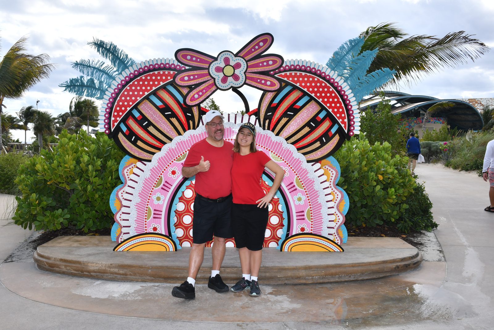 Us at the flower arch on Lookout Cay