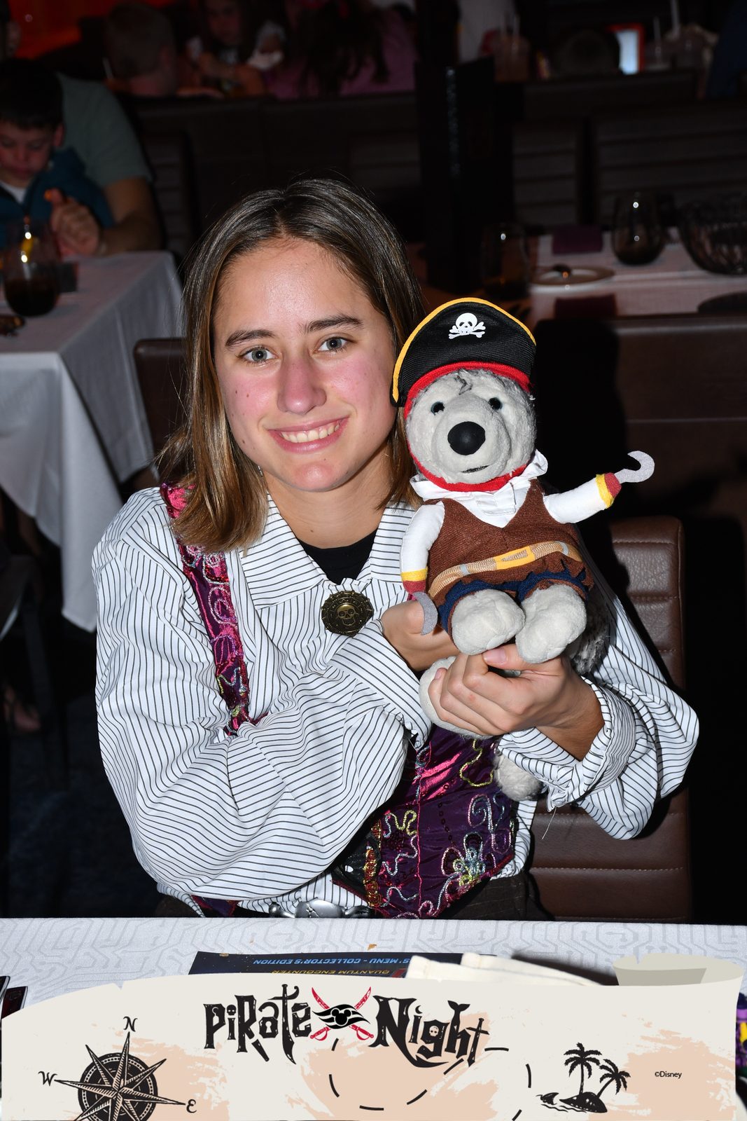 Pirate Mickey joins Lisa at dinner