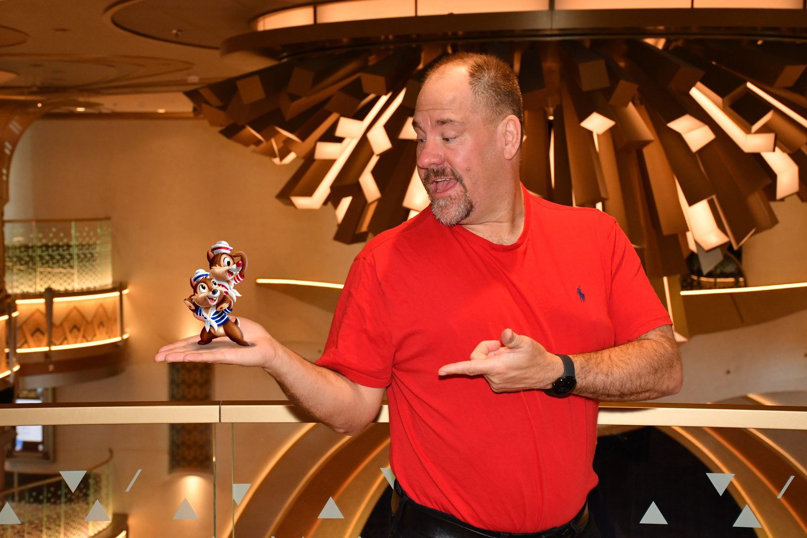Michael with a tiny Magic Shot figure in the Grand Hall