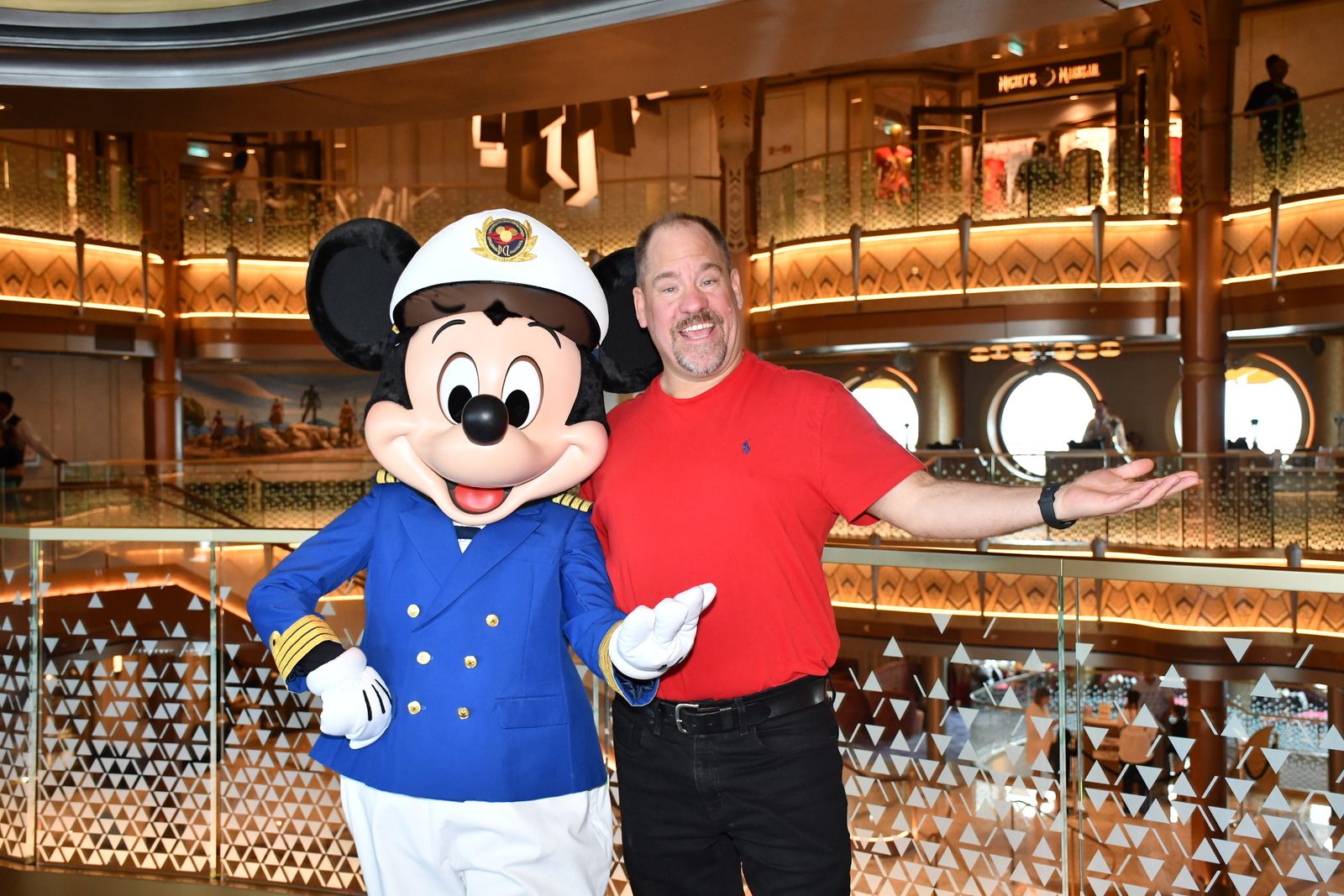 Mickey tips his captain's hat