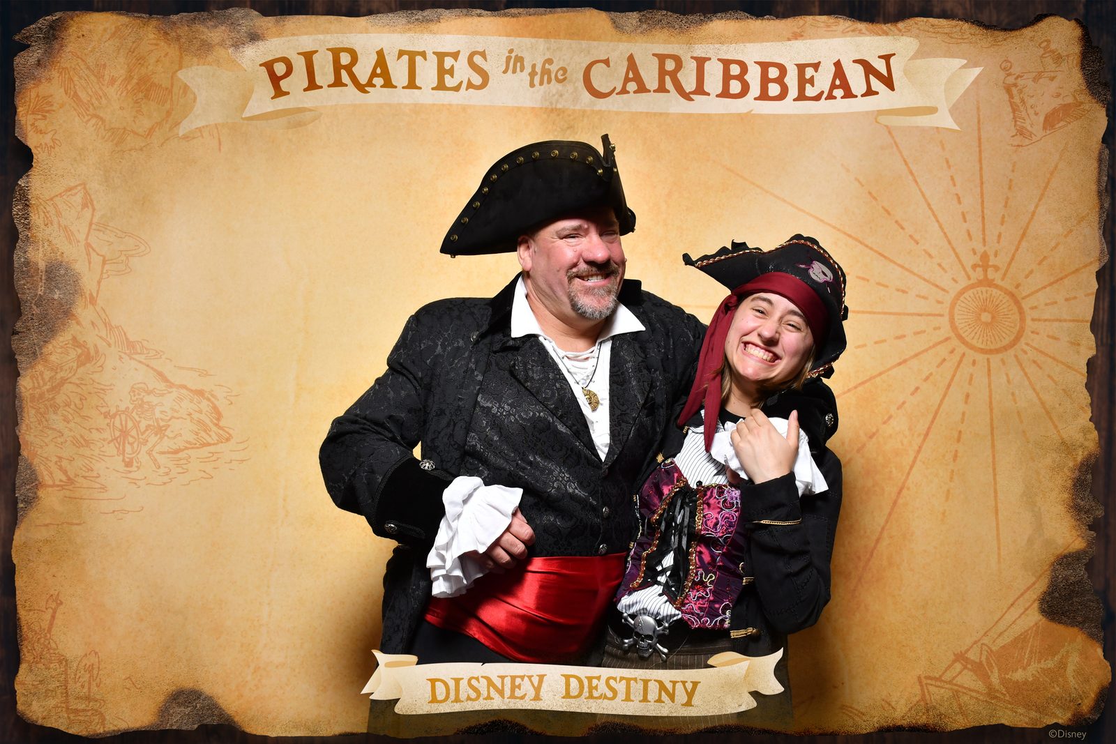 Lisa and Michael being silly at the pirate backdrop