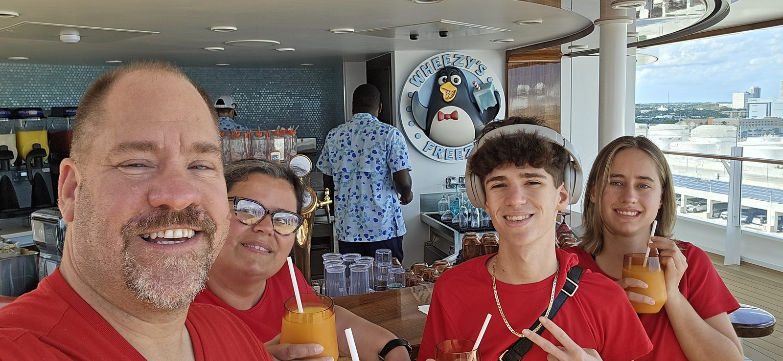 The four with drinks at a bar