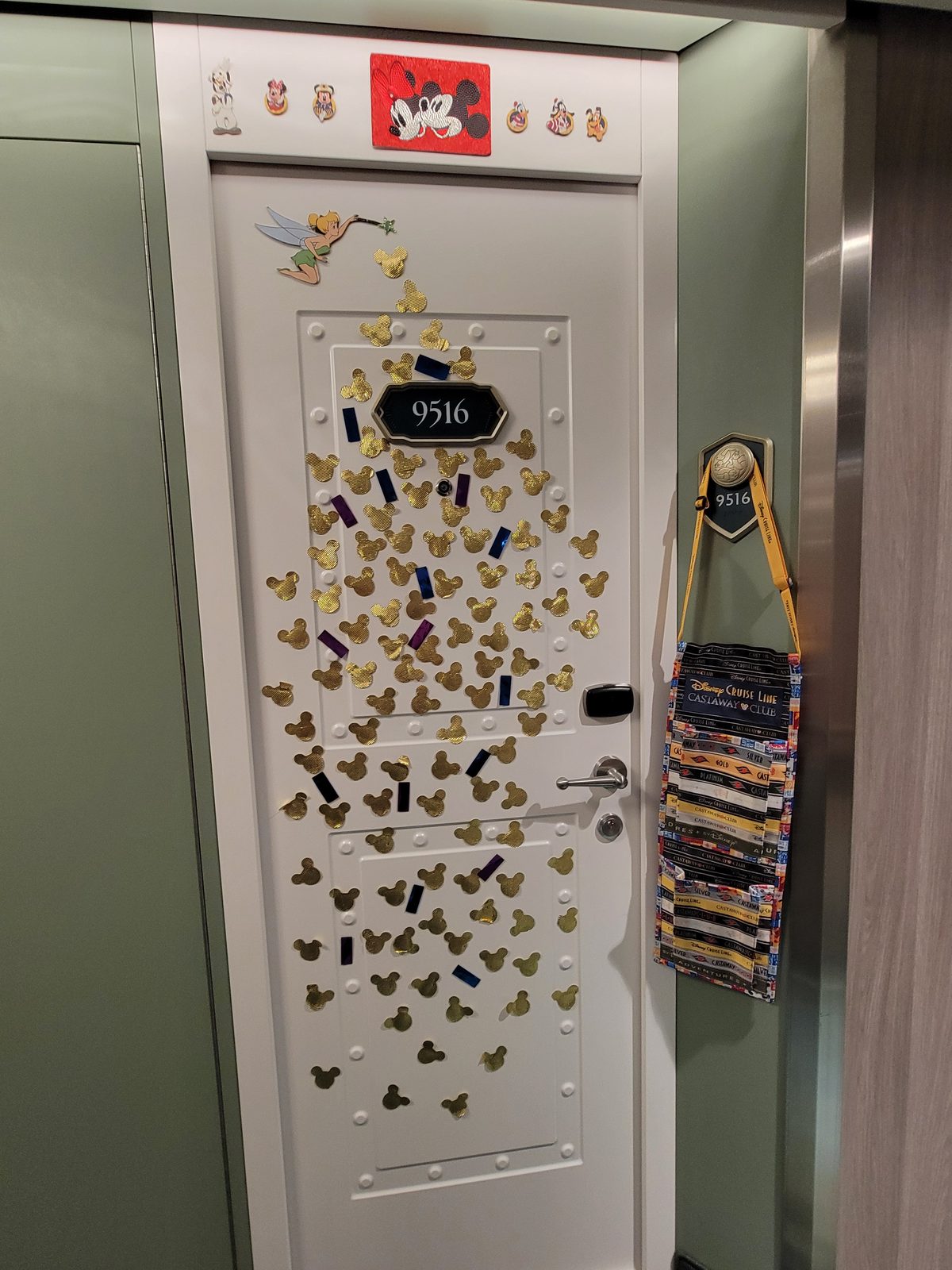 Our stateroom door dressed in Disney pins