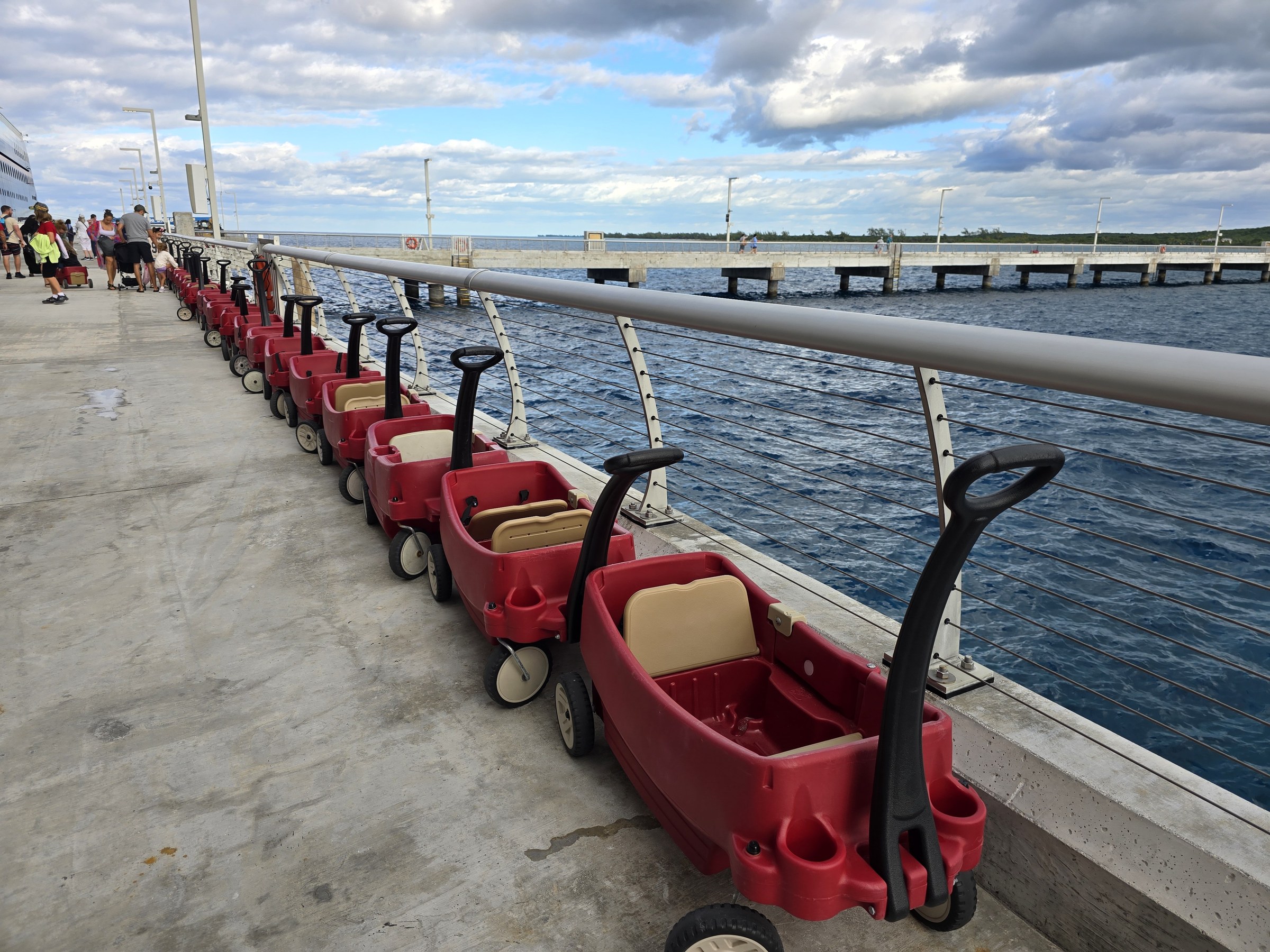 Red wagons lined up on the Lookout Cay pier
