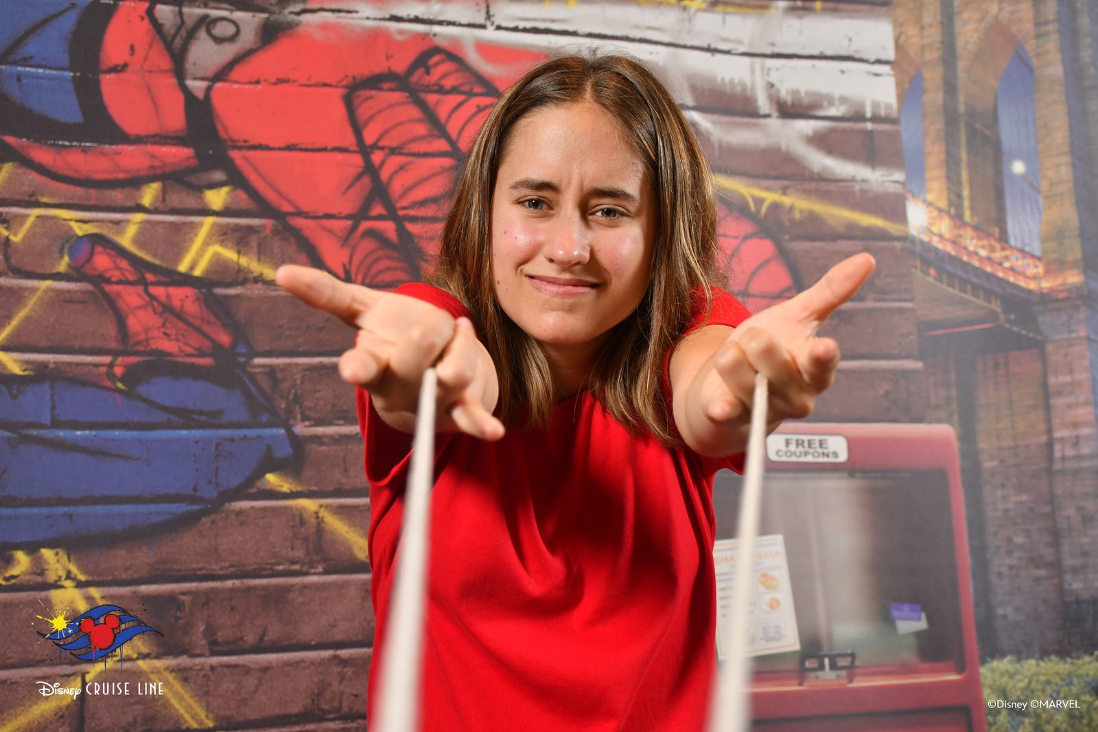 Lisa strikes a Spider-Man pose