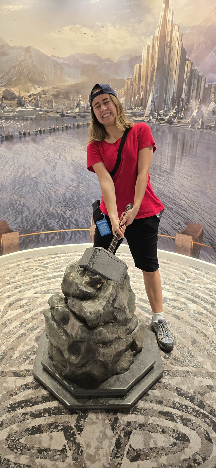 Lisa trying to lift Mjolnir aboard the Disney Adventure