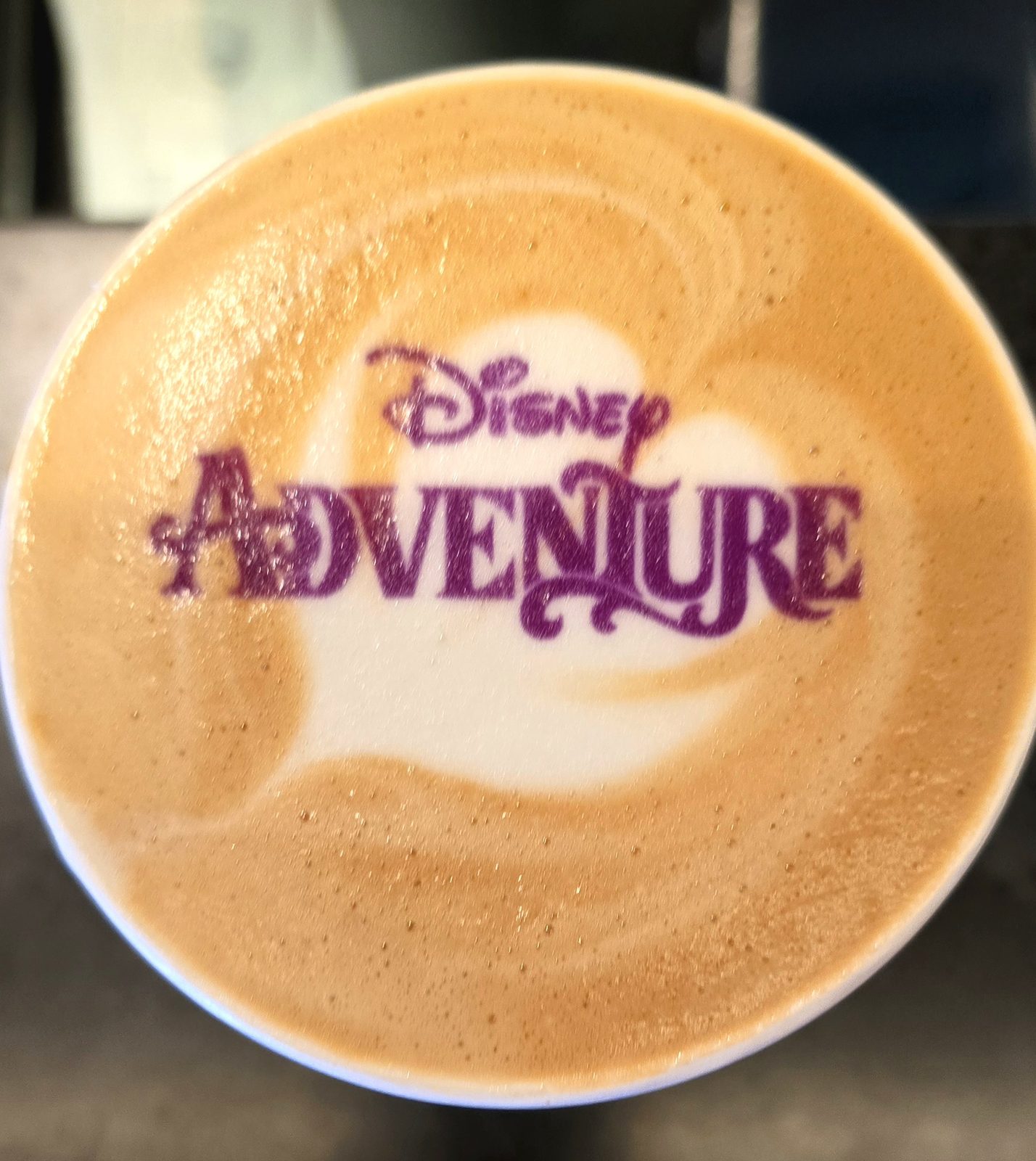 Coffee stamped with a Disney Adventure design