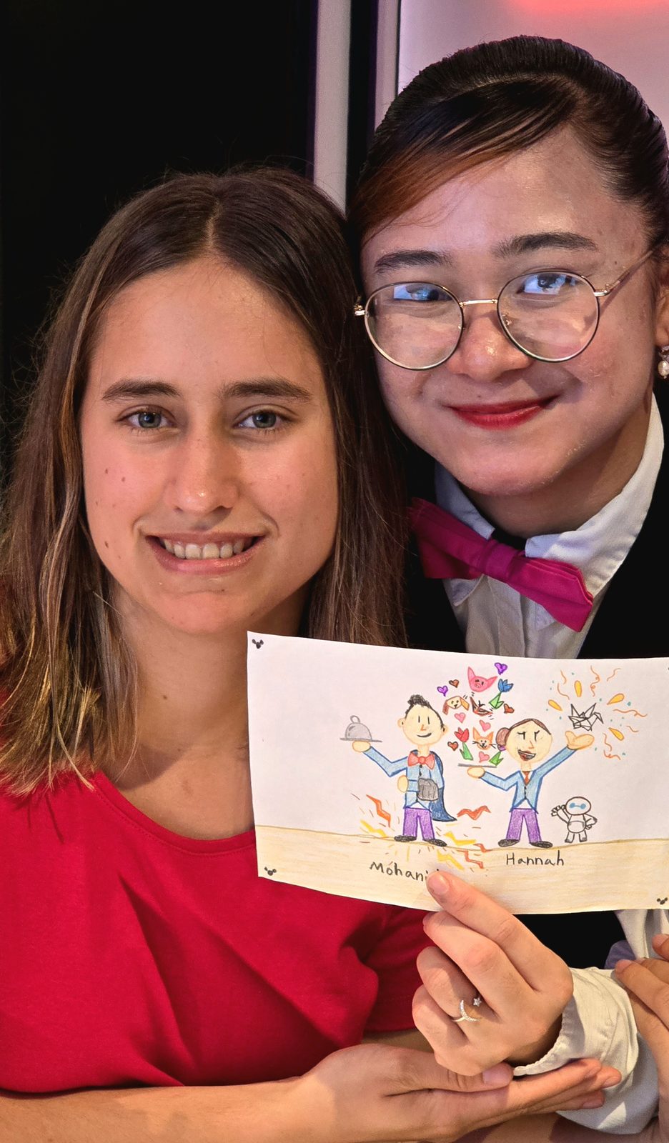 Lisa and Hannah, our server, with the drawing Lisa made for her