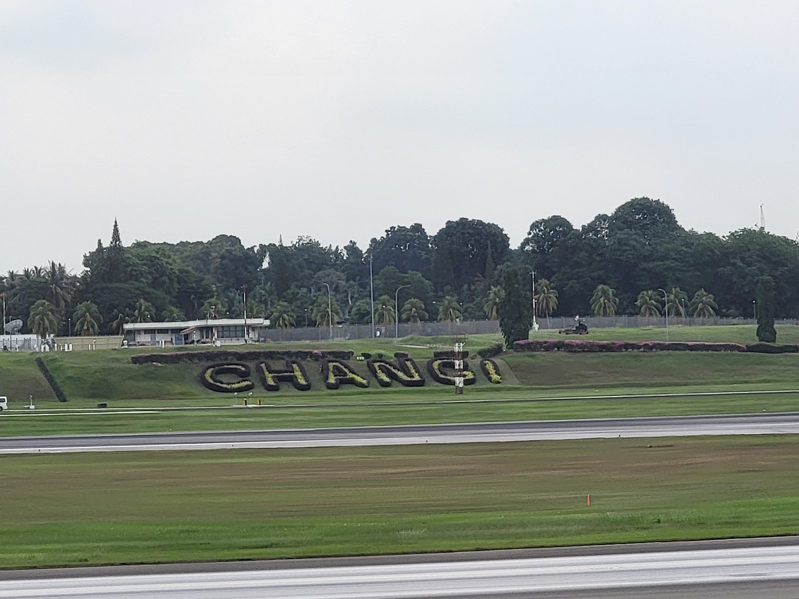 The Changi sign passing below on takeoff