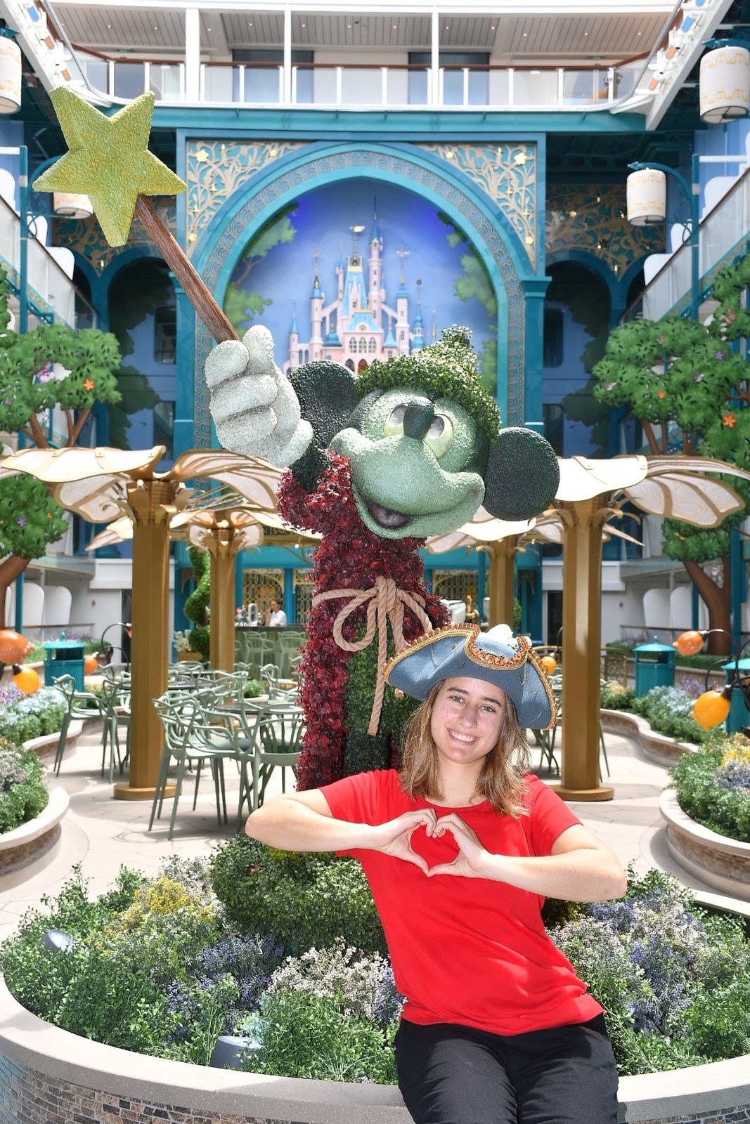 Lisa and the Mickey topiary in the Imagination Garden