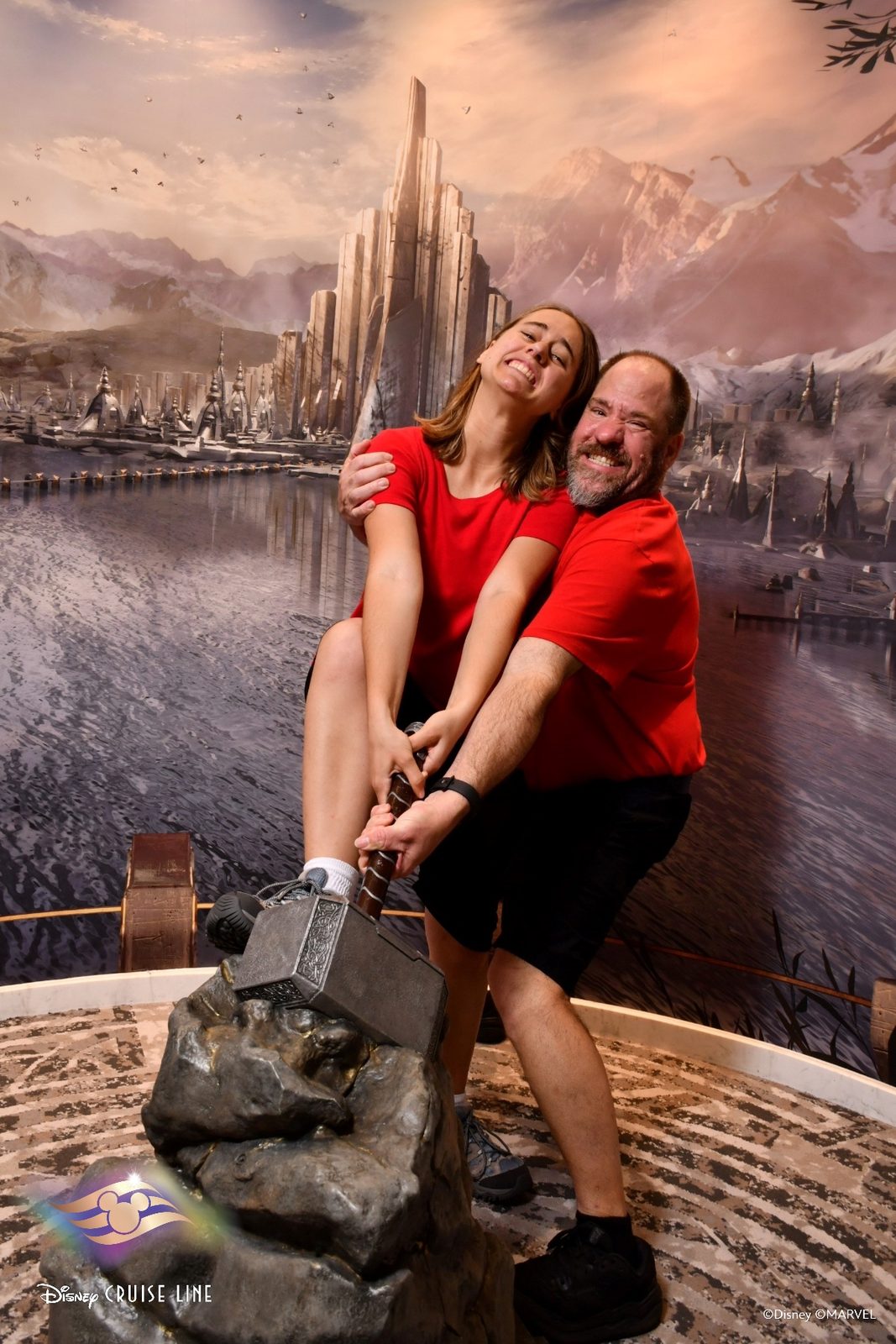 Lisa and Michael trying to lift Thor's hammer