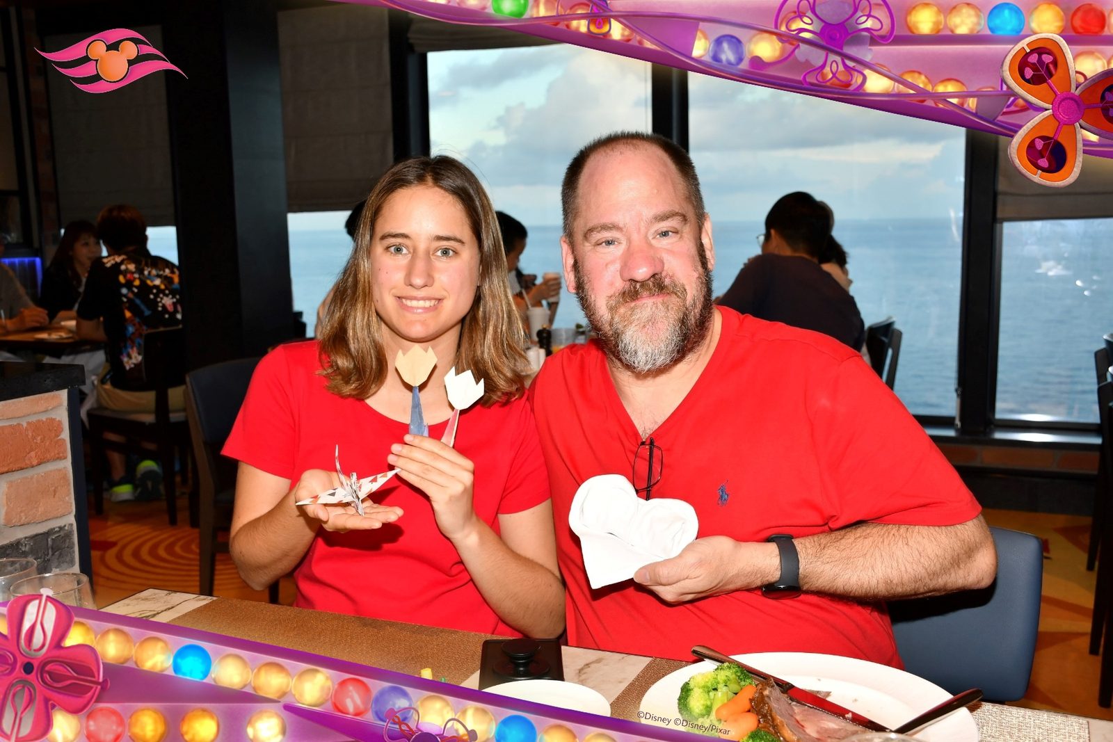 Lisa and Michael celebrating over dinner at sea