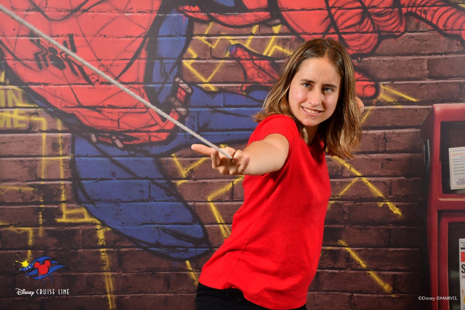 Lisa channeling Spider-Man on the wall