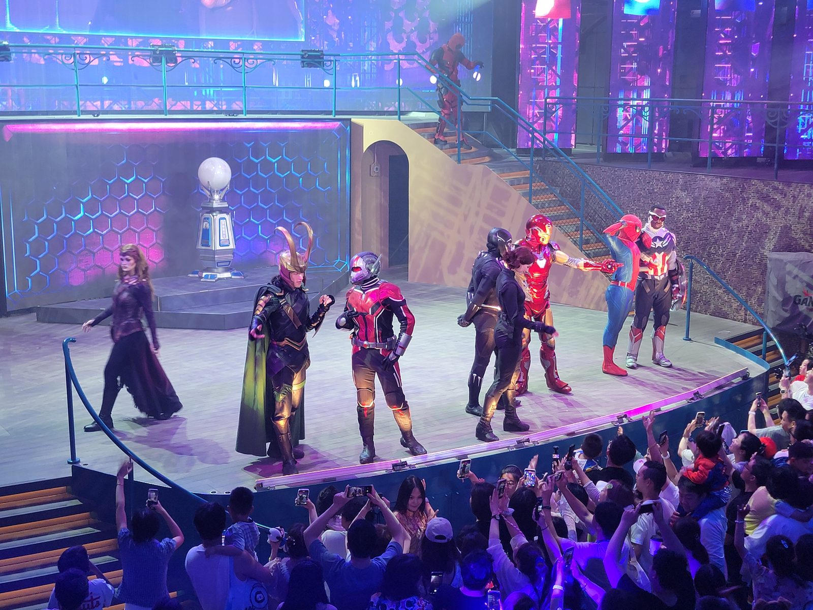 Scarlet Witch, Loki, Ant-Man, Black Panther, Iron Man and Spider-Man in the Marvel stage show on the Disney Adventure