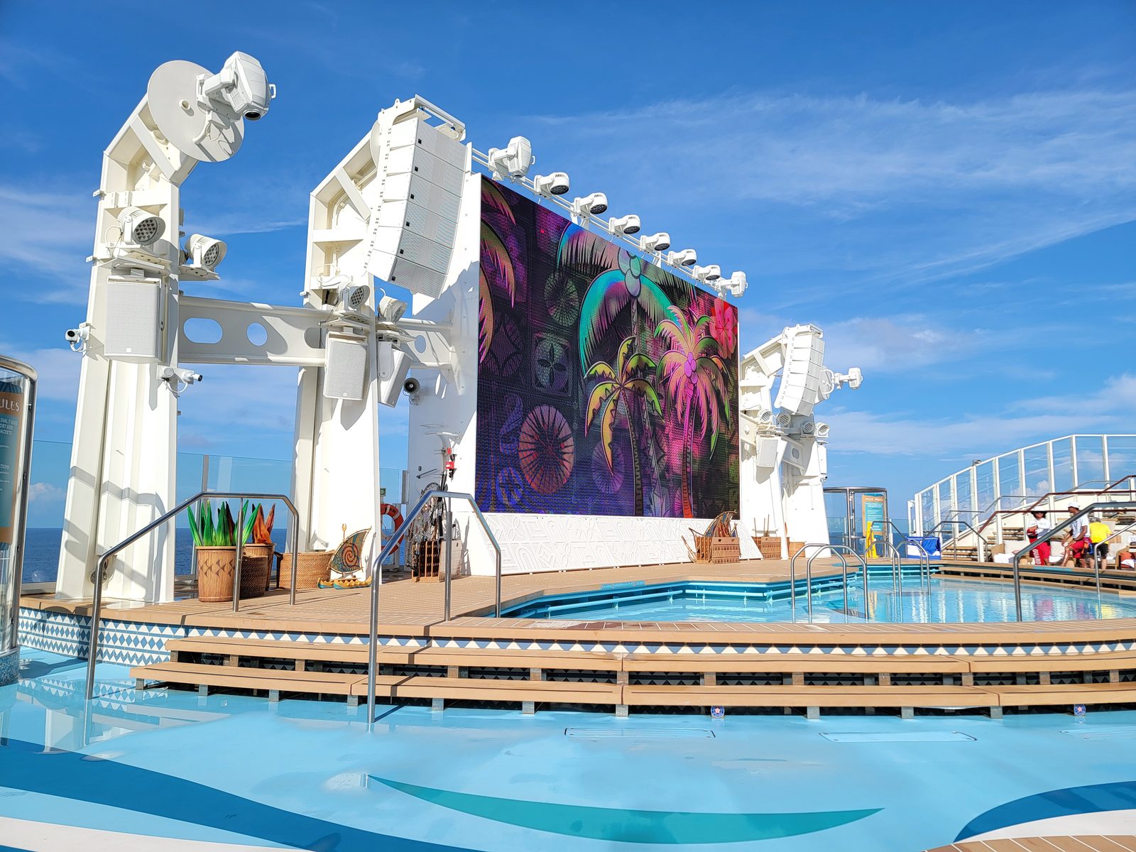 The pool deck stage and its big screen