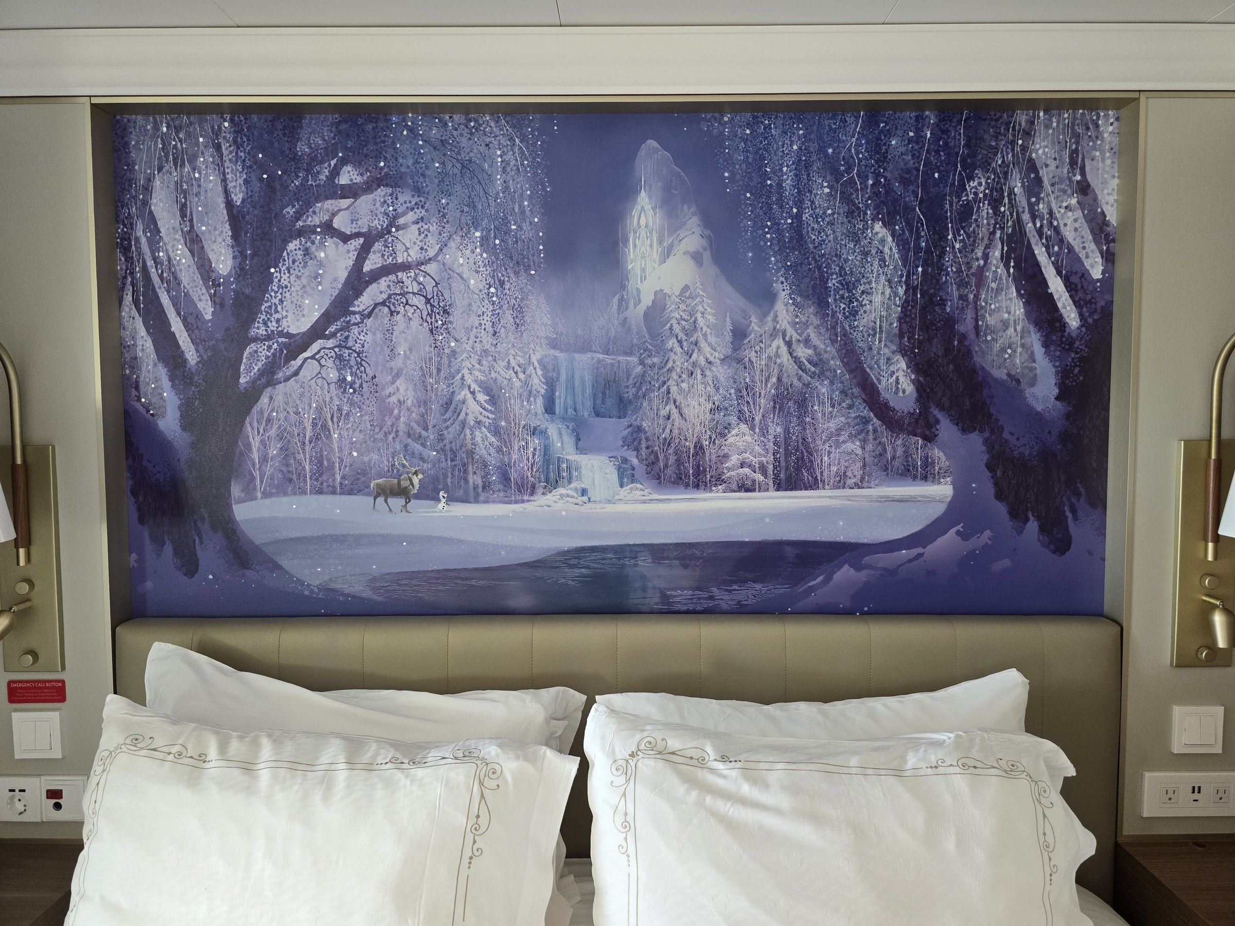 The Frozen mural over the bed