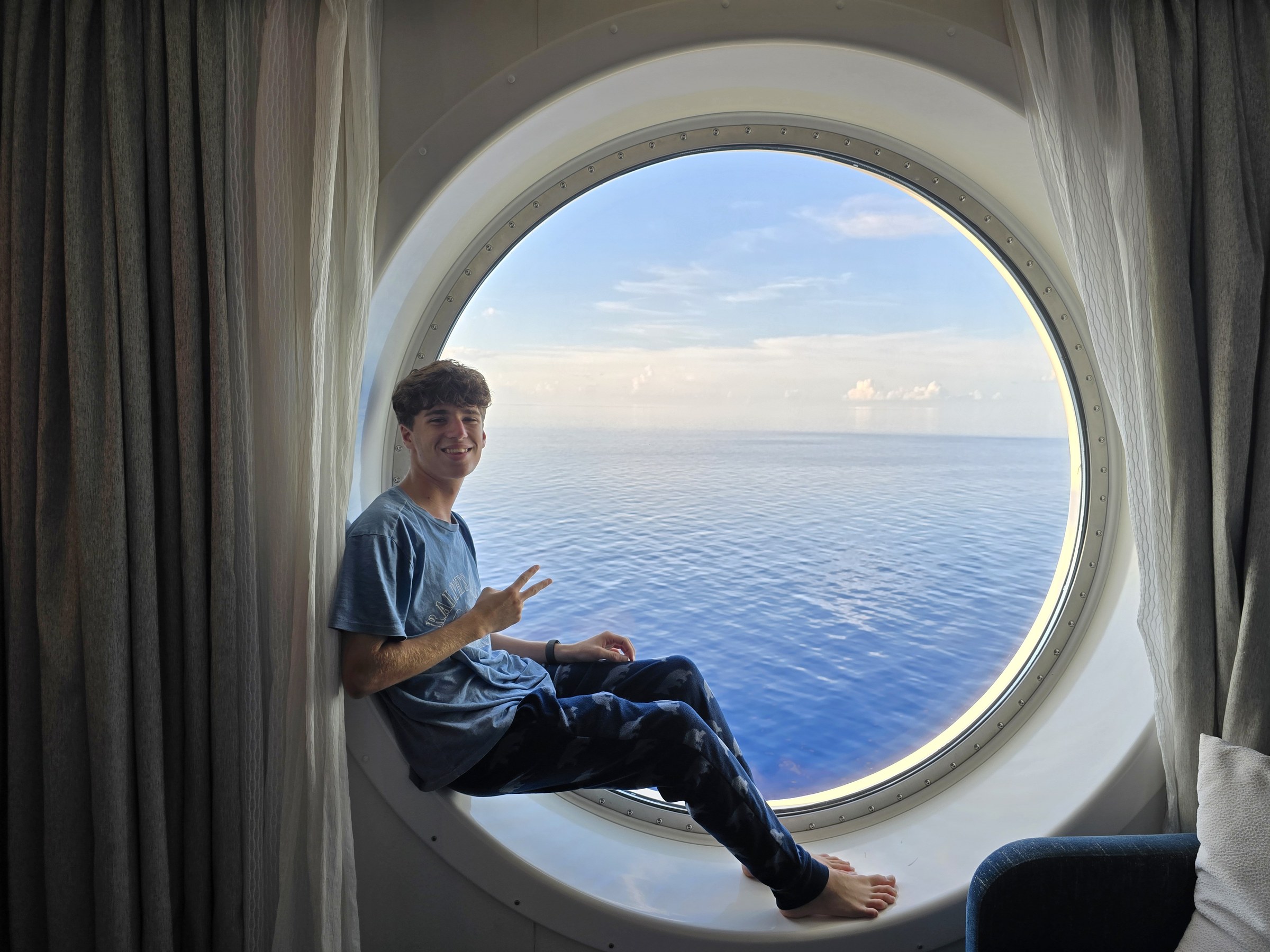 Thomas in the porthole seat